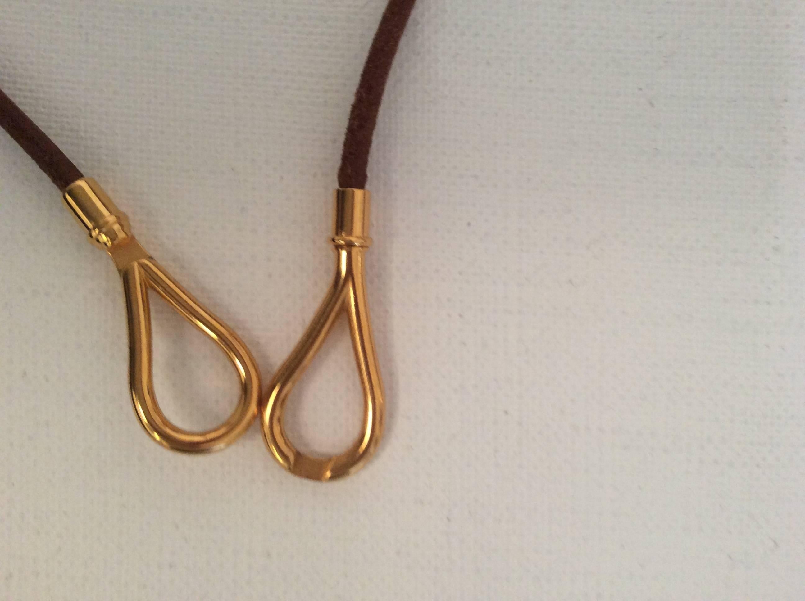 Hermes Gold Tone Love Knot Necklace 1
