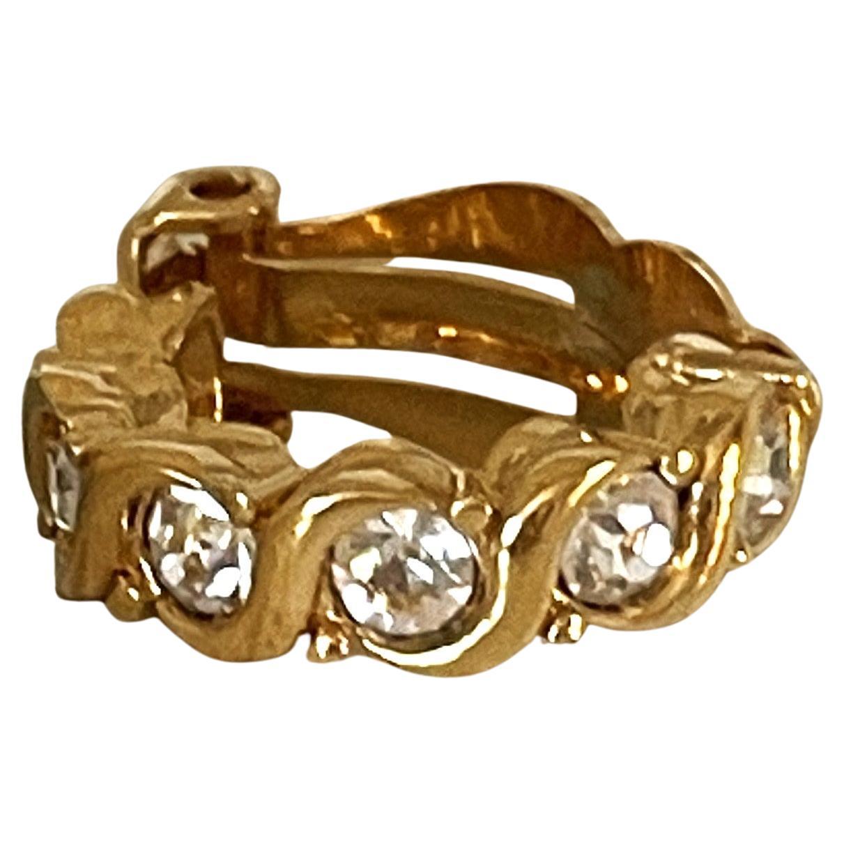 Par de medias lunas D
Orlan de los años 90 en tono dorado  Pendientes de metal con clip Cristales en venta