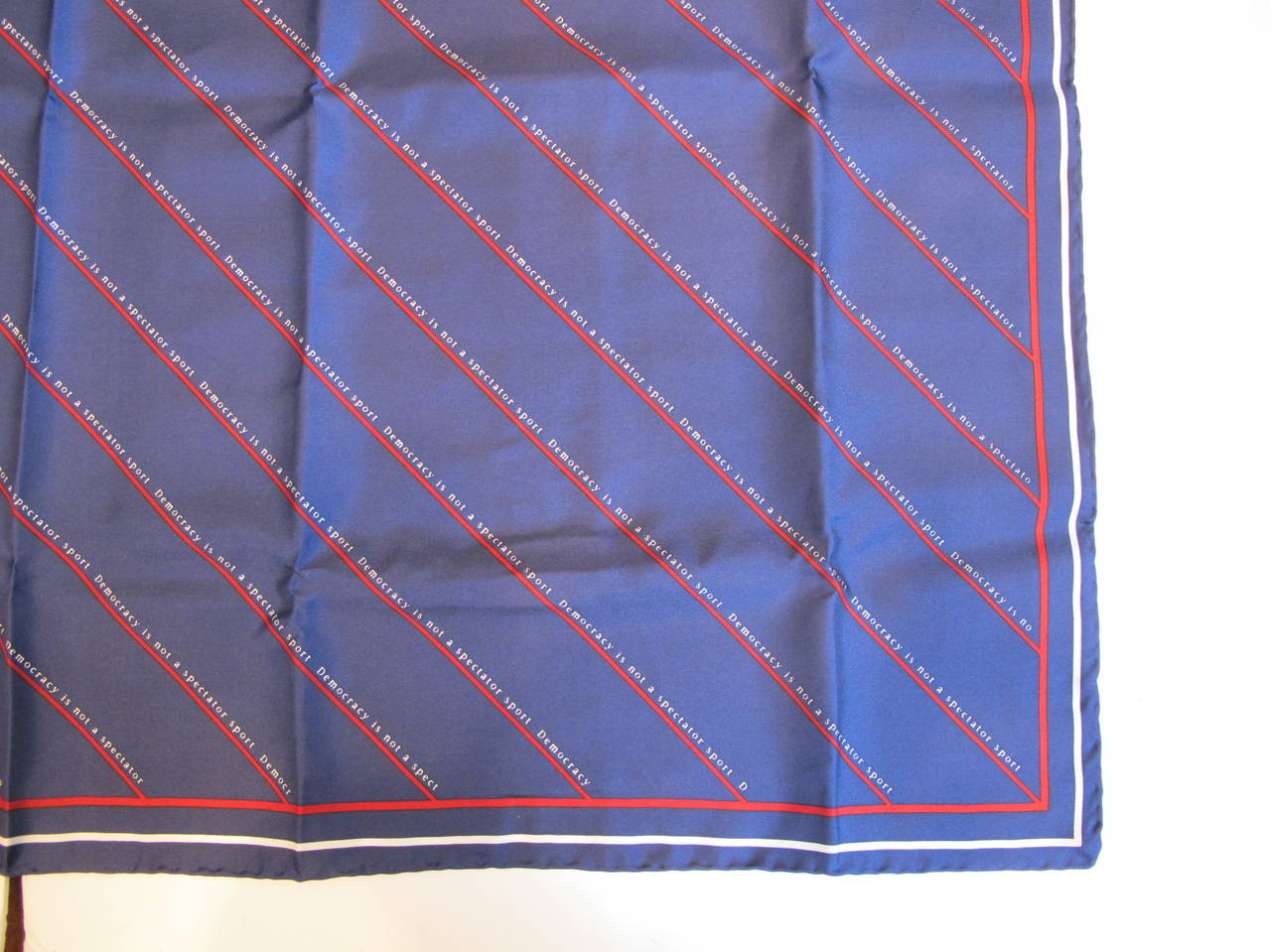 New . Old Silk Scarf with colors of navy, red and white. Hand-Rolled hem. It is a part of an estate from a Grande Dame in California who had a monumental collection of silk scarves.