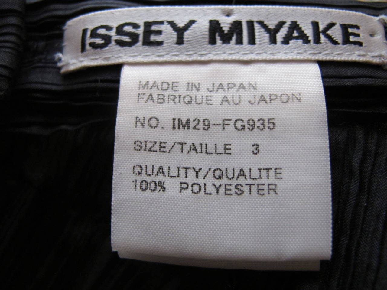 Issey Miyake Black Asymmetric Pleated Skirt For Sale at 1stDibs