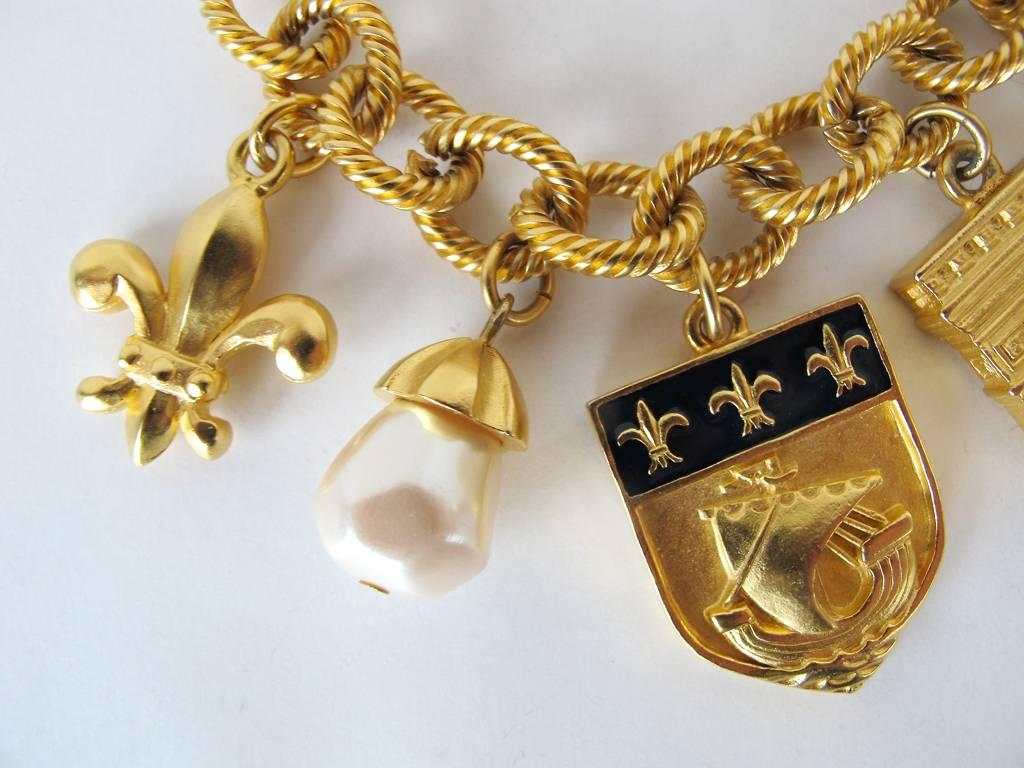Women's 1980's Karl Lagerfeld Gold-Tone and Pearl Paris Inspired Charm Bracelet For Sale