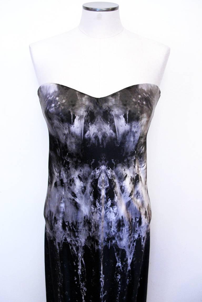 This striking 2010 Alexander McQueen strapless evening gown is in 100% silk crepe gray 