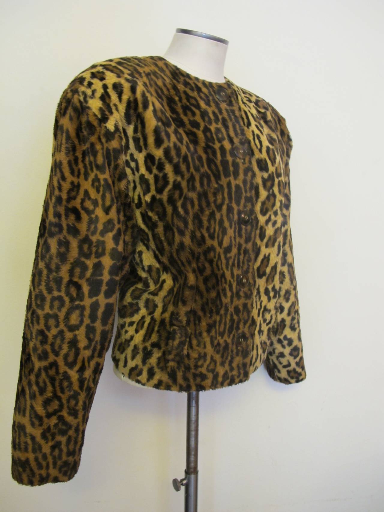 Bill Blass created his line Blassport in 1972. This leopard jacket is an iconic piece from the collection which was coveted by many women.  Some women found it affordable. There are 5 buttons, two pockets and belt loops. Sleeve length 21 inches.