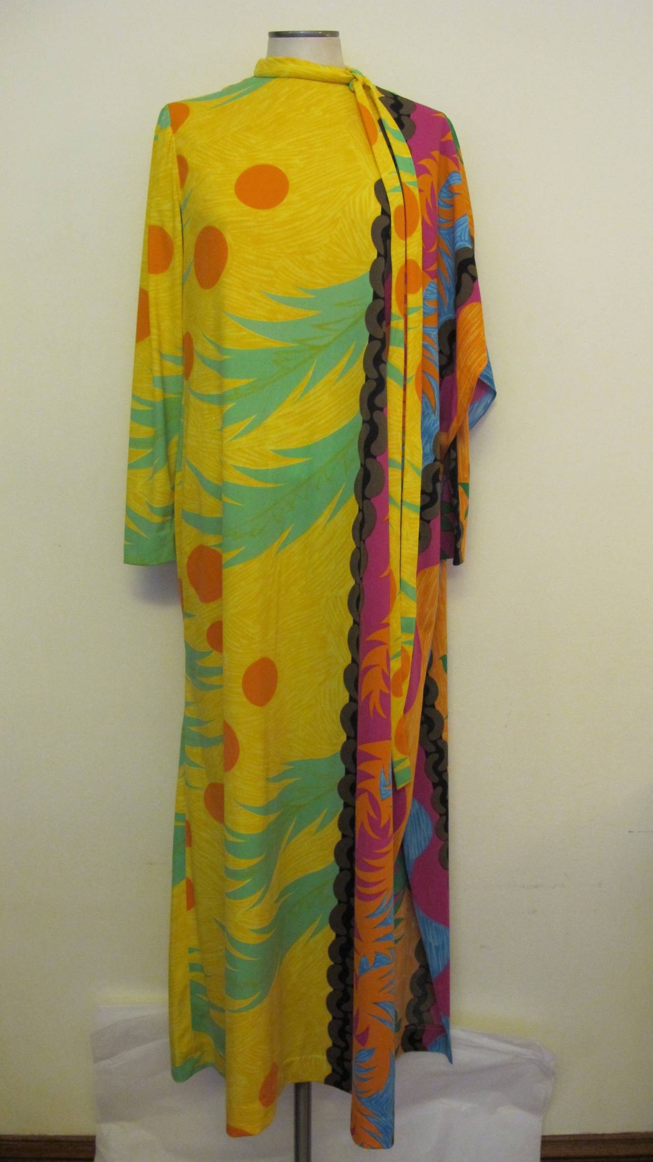 Youssef Rizkallah was the designer from 1969 to 1975 for Malcolm Starr. This fabulous tropical piece features sunset colors, palm trees and 