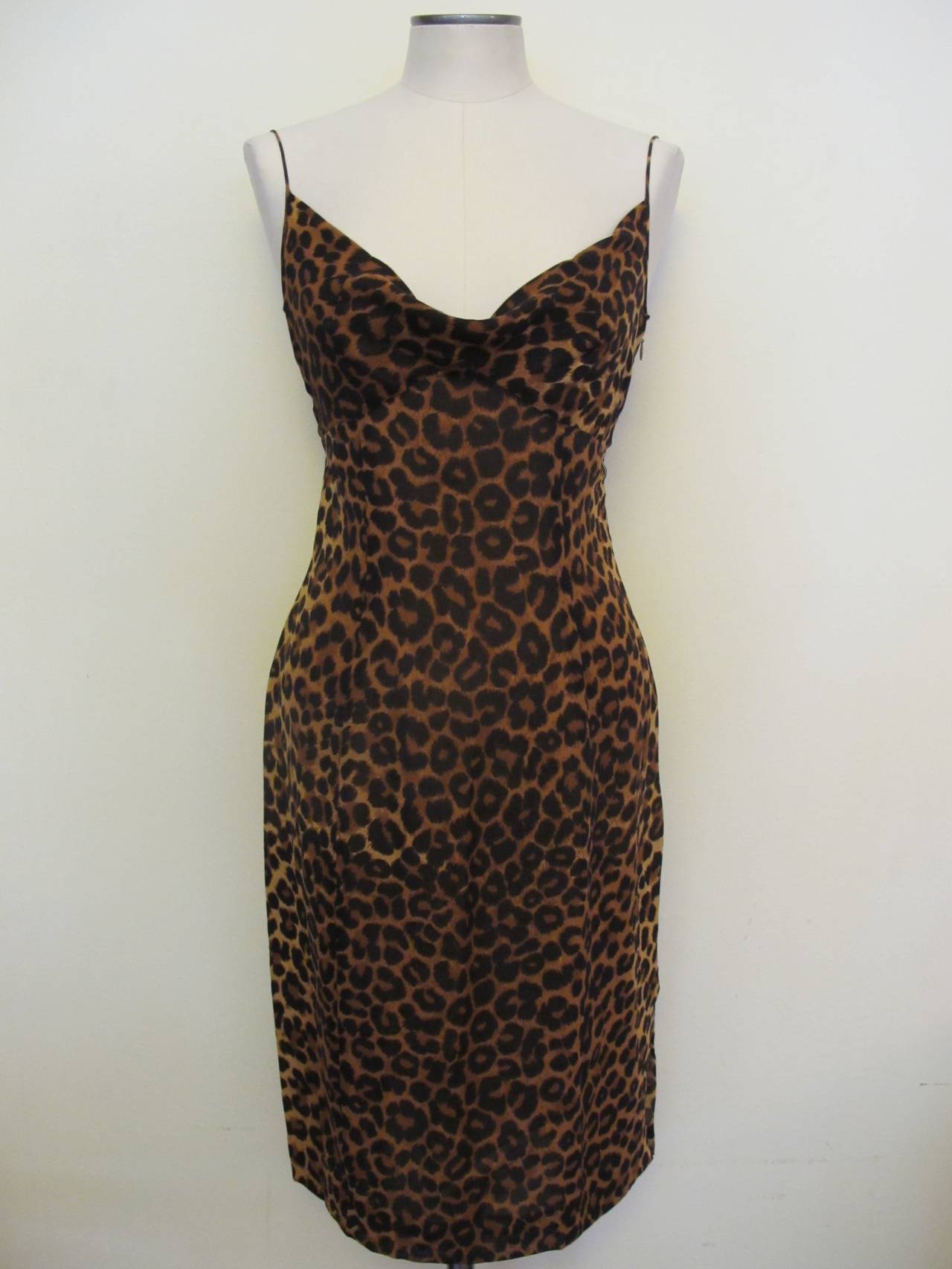 John Galliano's genius is reflected in this stunning leopard dress which is cut on the bias and lined in 100% silk. The 100% Silk Leopard Fabric is of the highest quality and the dress lends itself to shaping the body to perfection. The dress is new