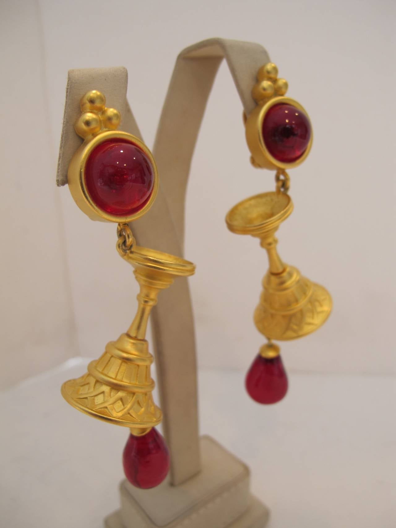 Fabulous, rare wine goblet earrings with red stones with goblets cascading with drops of red wine. Signed KL on the back.