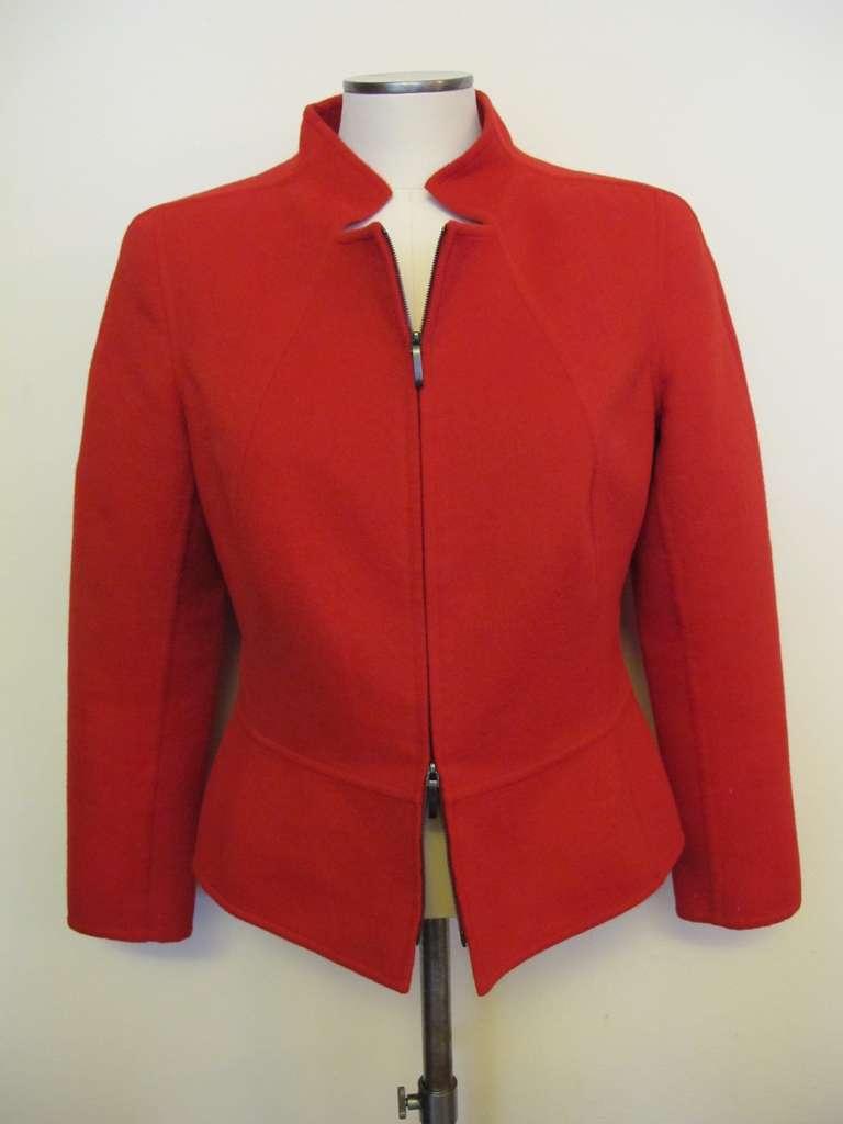 Elegant Versatile Red Jacket created from soft fabric with raglin sleeves in the back of the jacket. Mr. Kremler's impeccable workmanship creates fashion pieces that span time. The zipper is 18 inches. Zipper unzips from the top and bottom. Sleeve