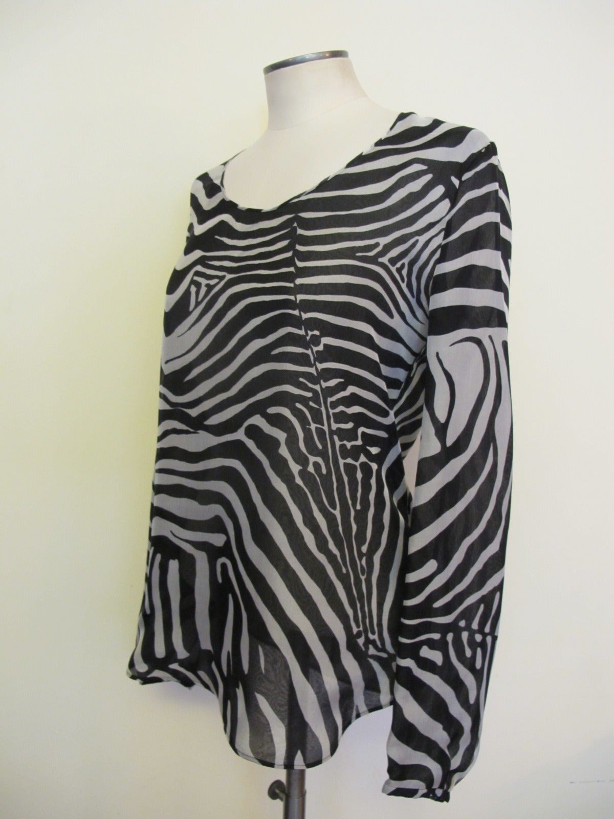 Chic Tom Ford Black and White Zebra Silk Blouse which is lined in silk.