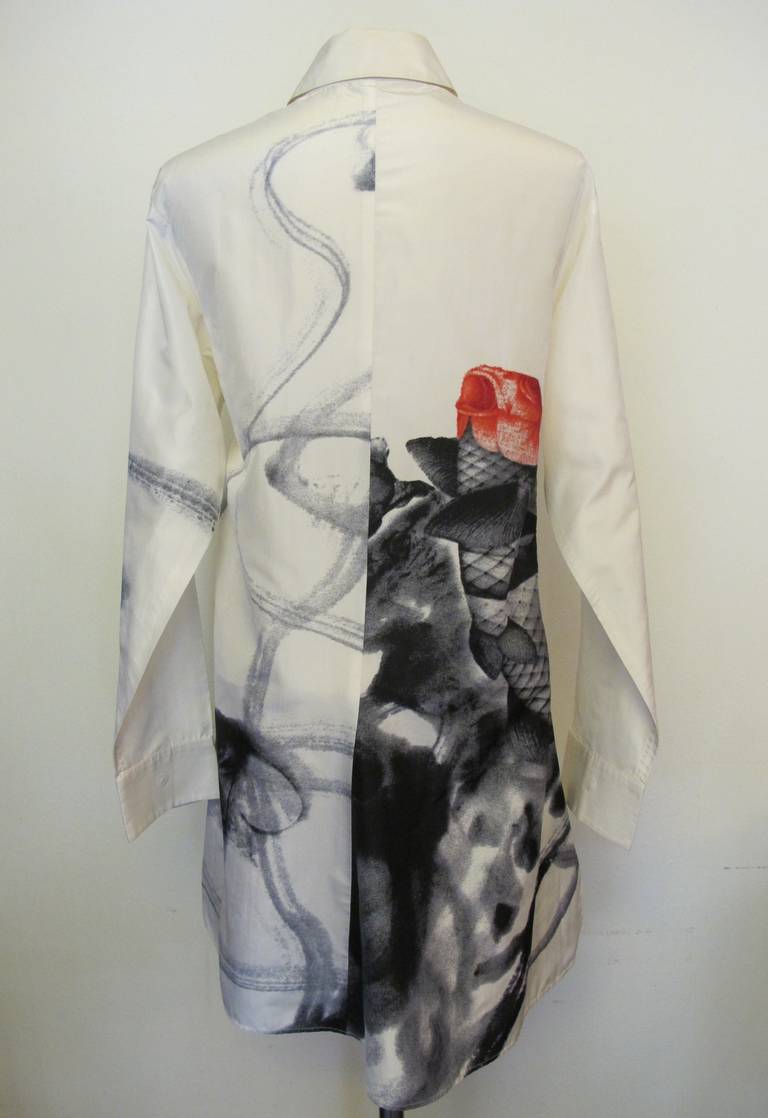 This rare, exceptional piece was a gift to Helpers by a former fashion director of Saks Fifth Avenue. Her collection is impressive! This extraordinary silk coat dress symbolizes the essence of Yohji Yamamoto's genius and celebration of life. He