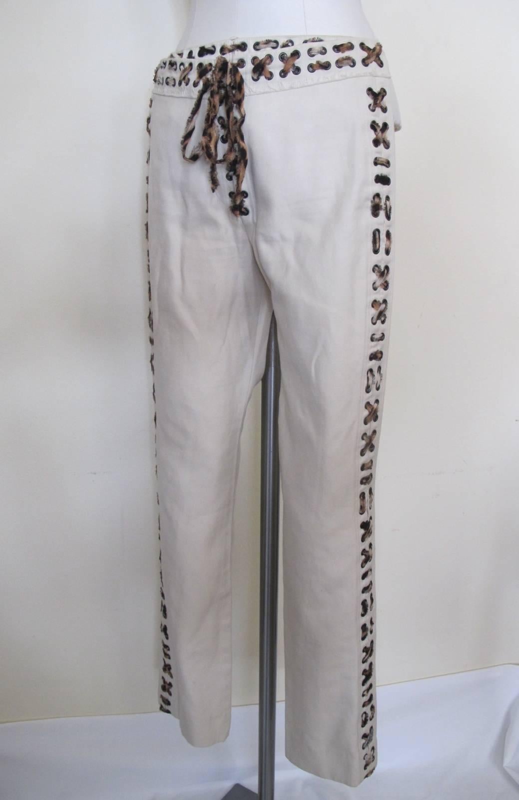 Over-the-top ivory cotton pants with leopard designed silk chiffon fabric serving as a 