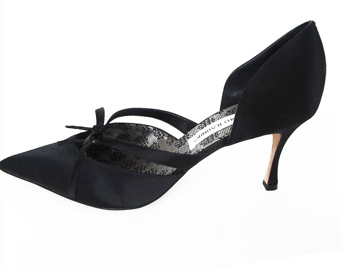These 1950's inspired black satin Manolo Blahnik evening shoes have a fabulous pointy toe and lovely bow detail on front. The thin heel is 3 inches high. The shoes are new/never worn.

*Your Purchase Benefits Those Who Are Developmentally Disabled.
