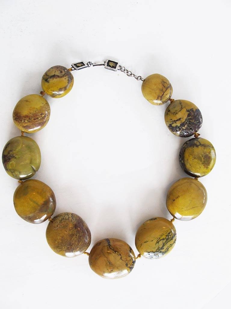 Natural genuine Picture jasper nugget choker necklace. The jasper nugget beads are knotted and the decorative clasp is sterling silver with hook style closure.

YOUR PURCHASE BENEFITS THOSE WHO ARE DEVELOPMENTALLY DISABLED.