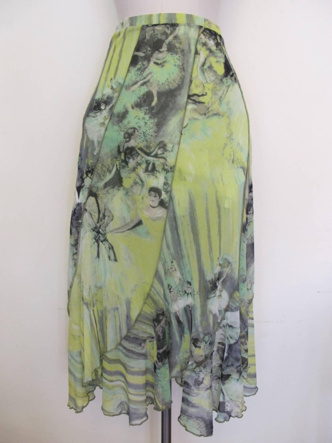 This gorgeous umbrella cut skirt flares out when walking. The super stretch fabric lends to the perfect fit of the fashion piece. Lime green chartreuse and black are the colors which serve as the background for the exquisite ballerina theme. Length