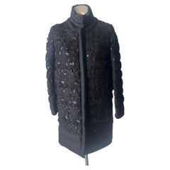 Abrigo de plumón Moncler Première negro con bordado floral