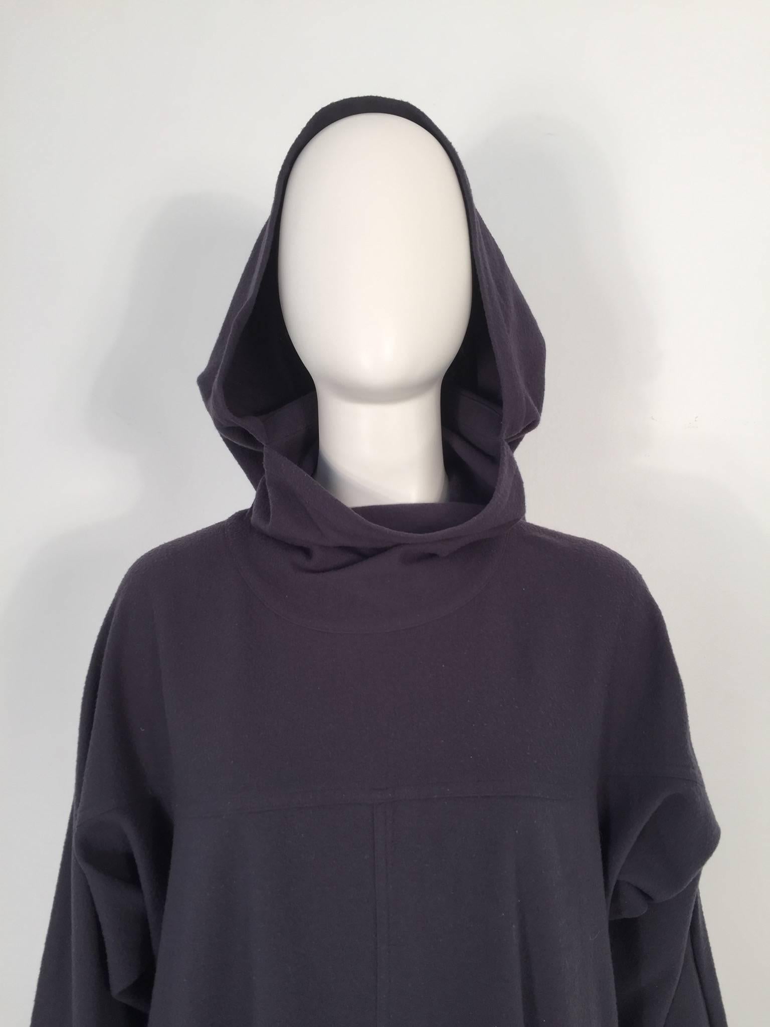 Issey Miyake 1980's fleece dress features 27'' sleeves and 20'' hood.

For International orders, please contact us for a shipping quote.
