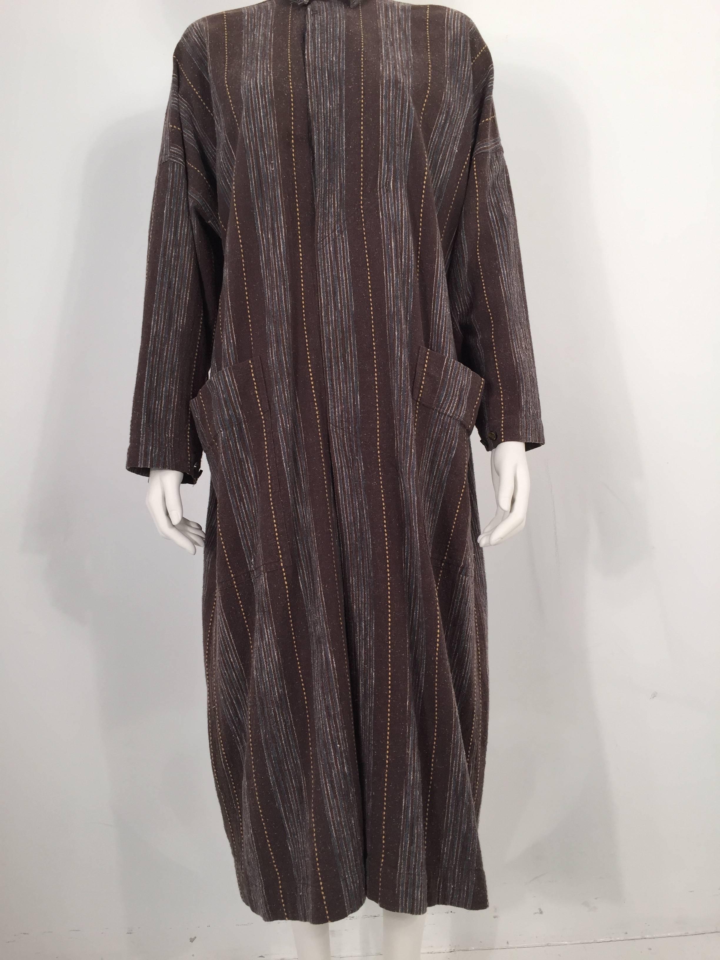 Issey Miyake Plantation 1980's dress features stripes, front pockets and a button closure. 

Measurements: Sleeves: 16''

For International orders, please contact us for a shipping quote.