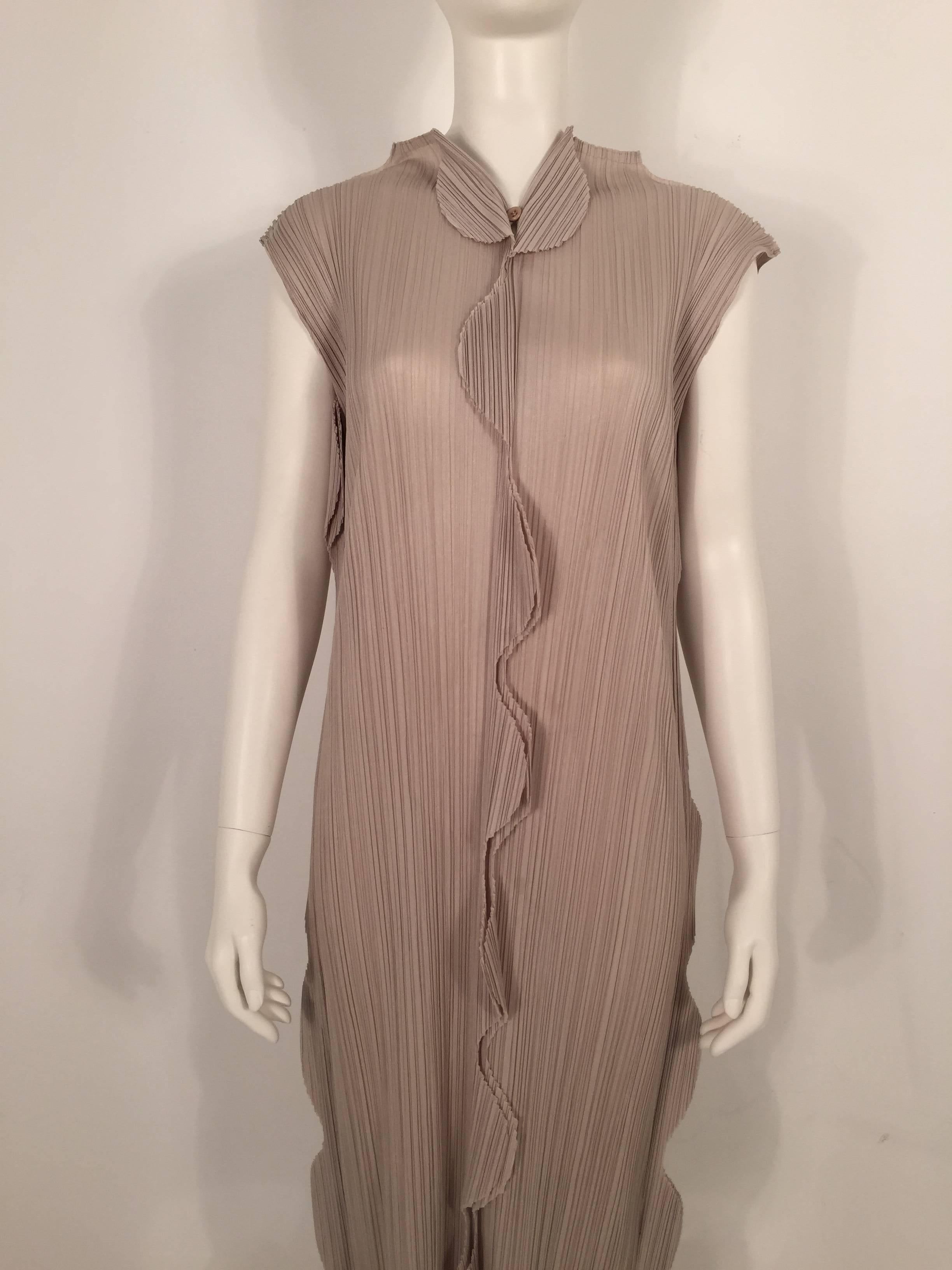 Issey Miyake Pleats Please 1990's dress features a series of panels along the center, back, and sides.

For International orders, please contact us for a shipping quote.

