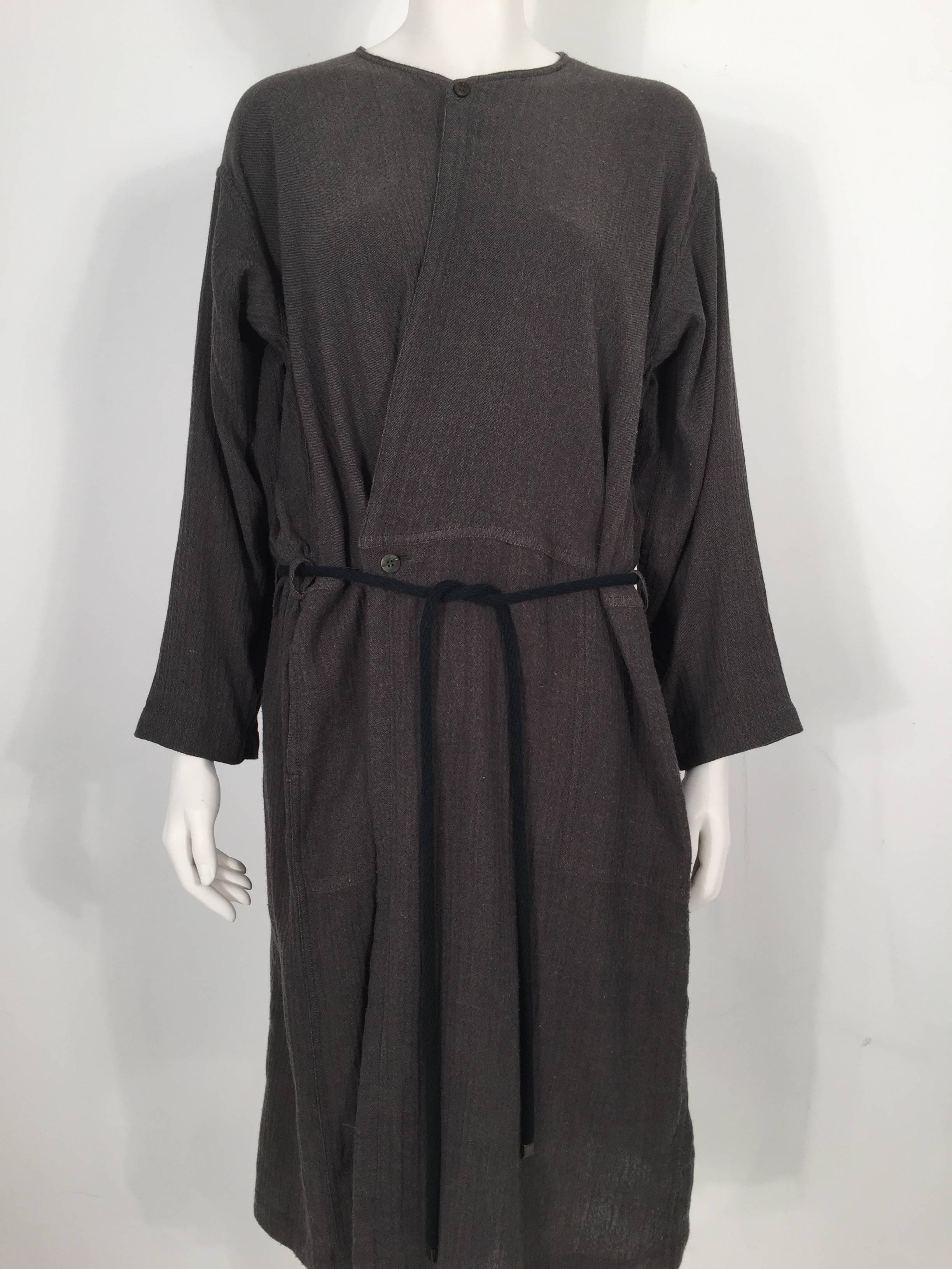 Issey Miyake Plantation 1980's dress is 100% Cotton and features an adjustable belt.

Measurements: Sleeves: 21''; Button Closure: 15''

For International orders, please contact us for a shipping quote.