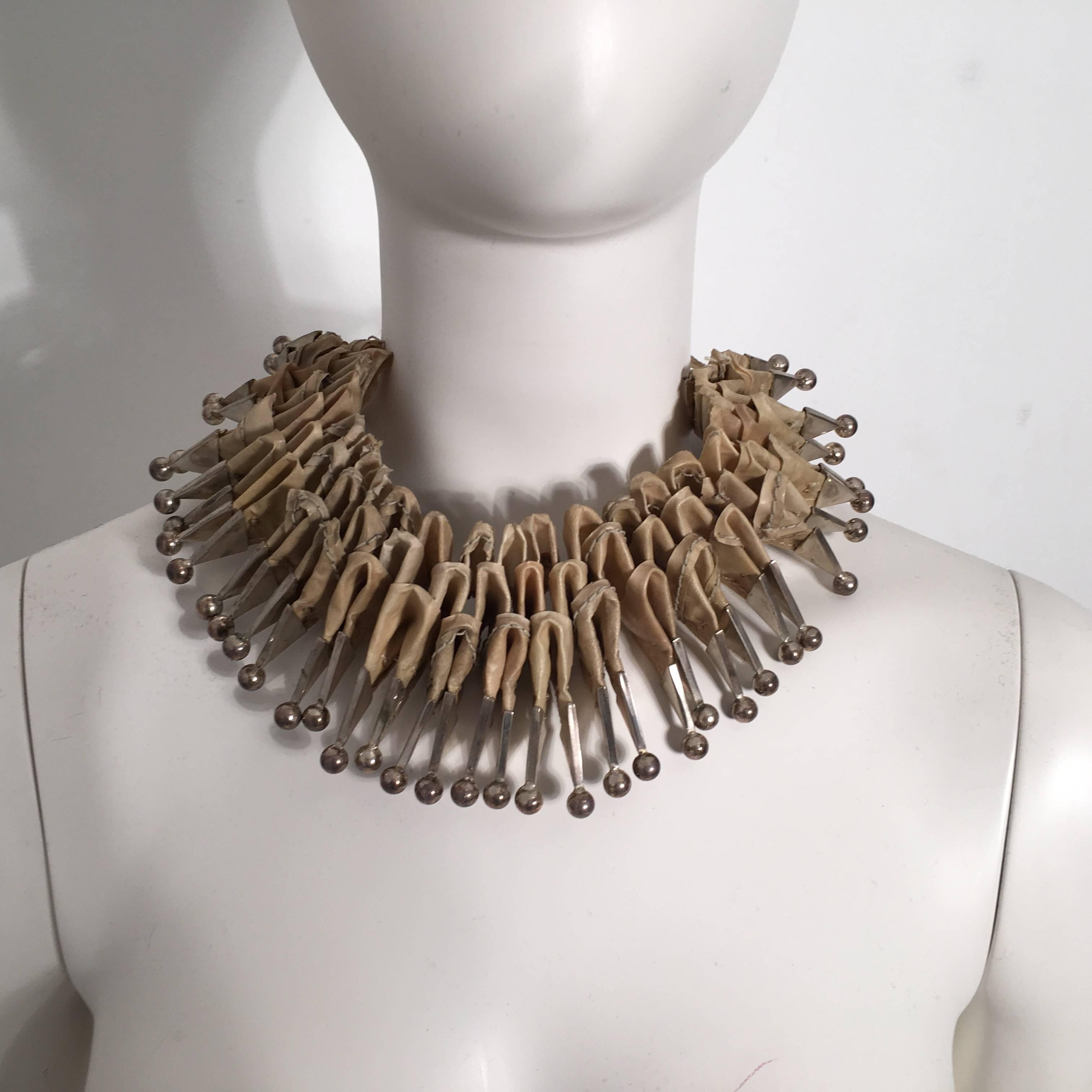 Handmade by Perez Sanz (Argentine Artist) - 925 Silver Tips Intestine Necklace

Measurements: Length: 18''; Depth: 3''; Weight: 6 Oz.

For International orders, please contact us for a shipping quote.
