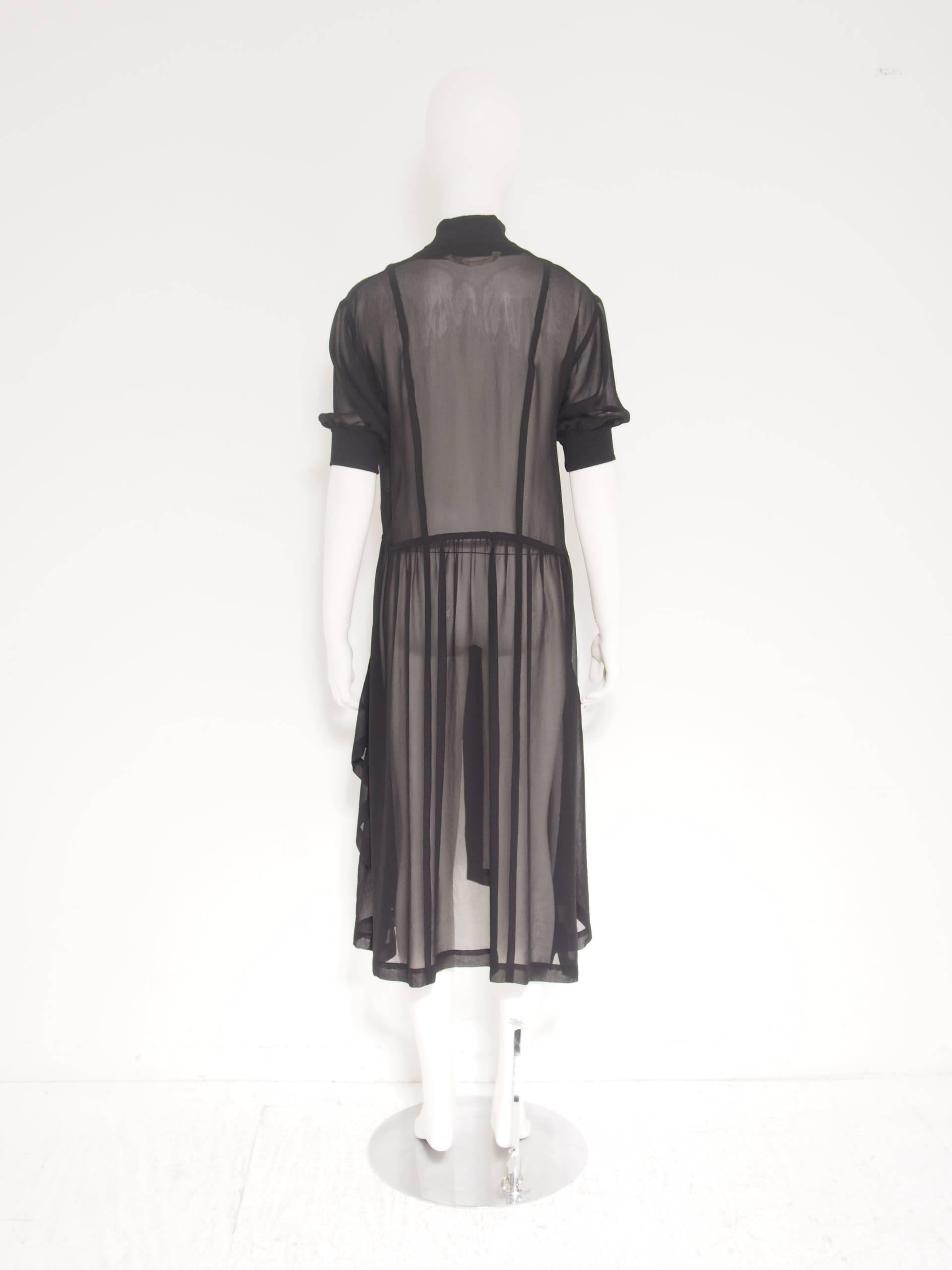 Iconic 1980s Comme des Garçons sheer black silk chiffon zipper closure dress.