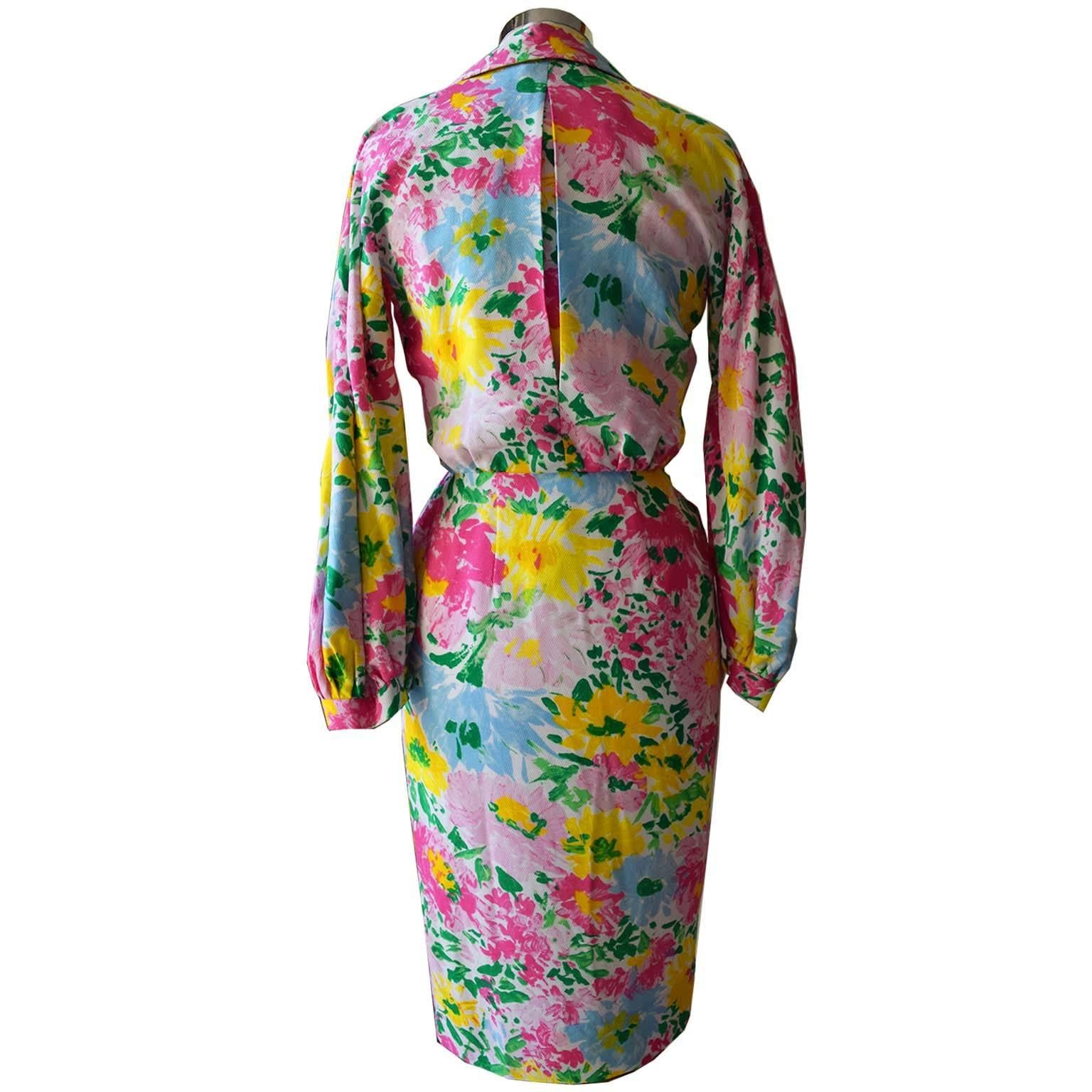 Christian Dior pret-a-porter 'Modele Exportation' floral print collared wrap dress from late 80s. Superbly colourful floral print. Bishop style sleeves. Blouse part is lined in a fine silk mesh fabric, skirt part is lined in heavier fabric. Skirt