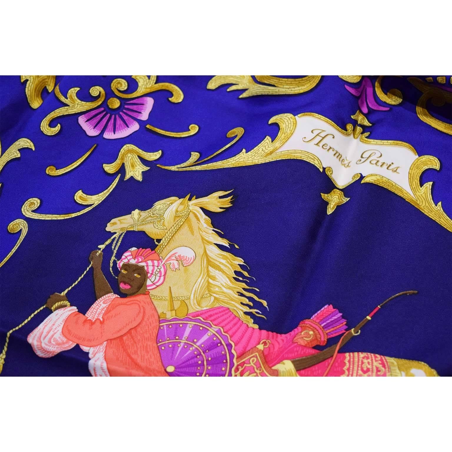 Hermes 'Cheval Turc' vintage scarf. 100% Silk. Made in France. Navy, blue, red, gold, pink, purple shades. Designed by Christiane Vauzelles for Hermes in 1969. No box.

Details:
Creator: Christiane Vauzelles for Hermes
Place of origin: