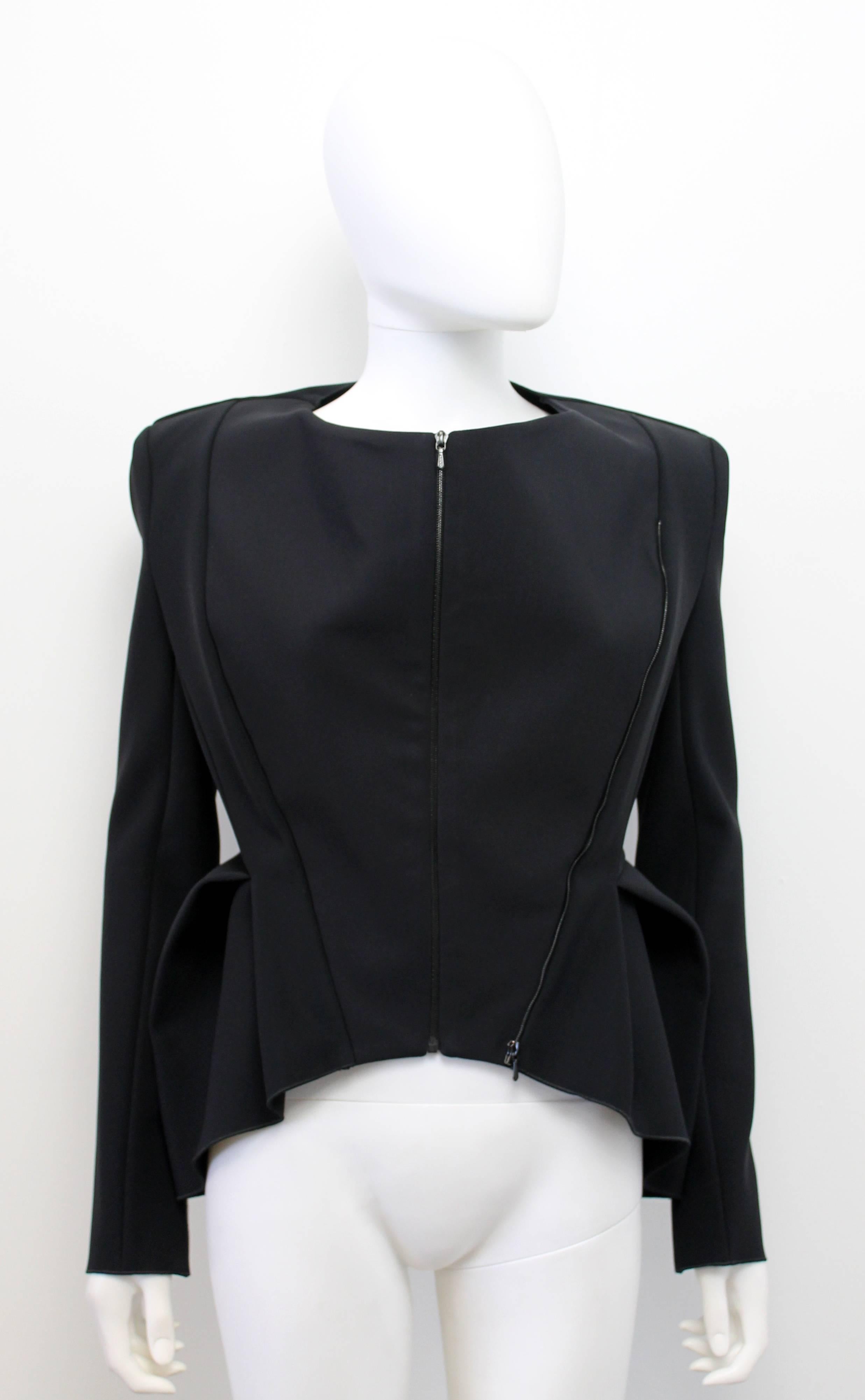 Incredible architectural jacket by Australian brand Dion Lee from Resort 2013. The front has two zip options to allow the wearer the option of a more fitted silhouette. Also features braid-like knots up the back. 