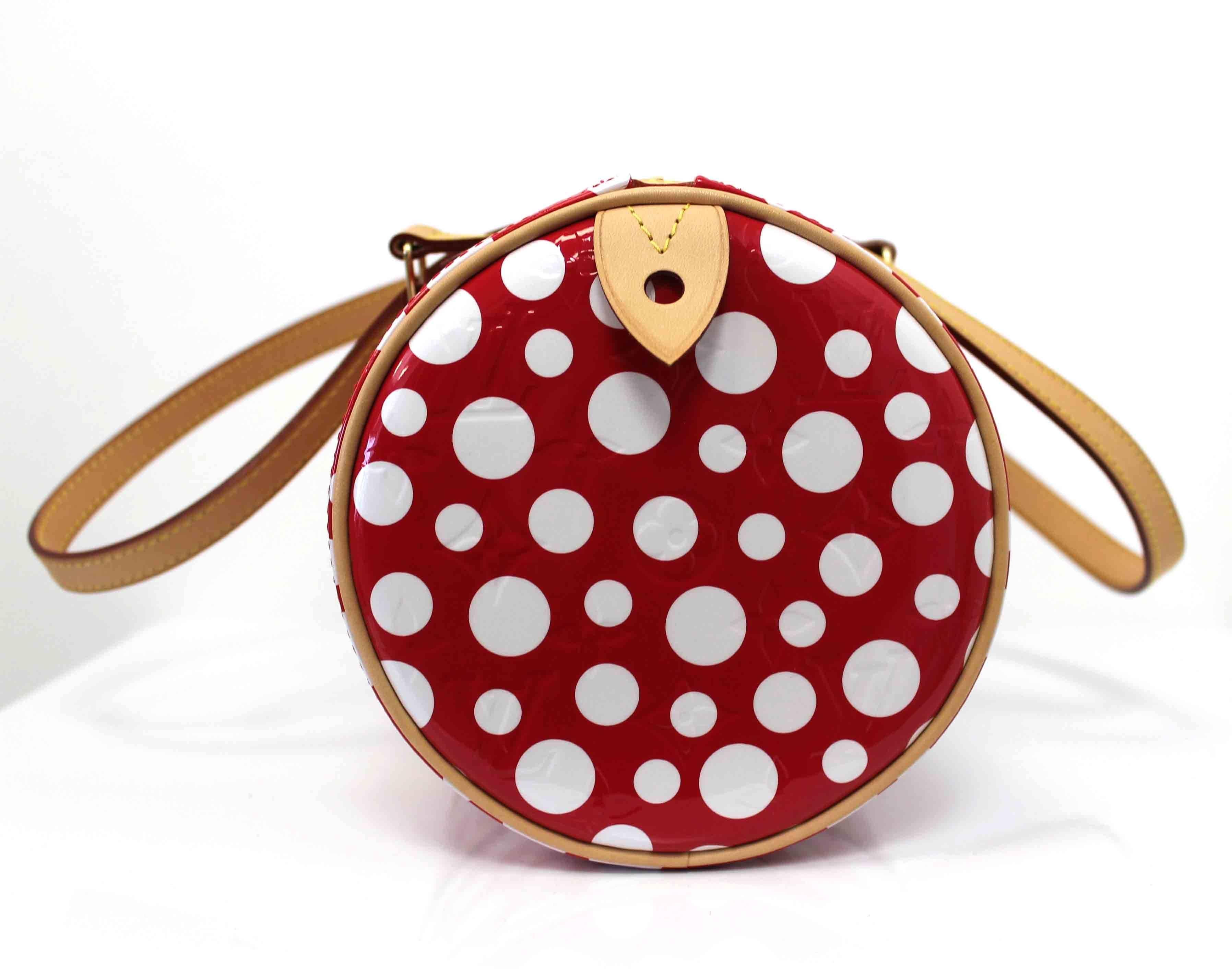 Iconic vernis polka dot bag by Yayoi Kusama for Louis Vuitton from SS 2012. Features an imprinted 
