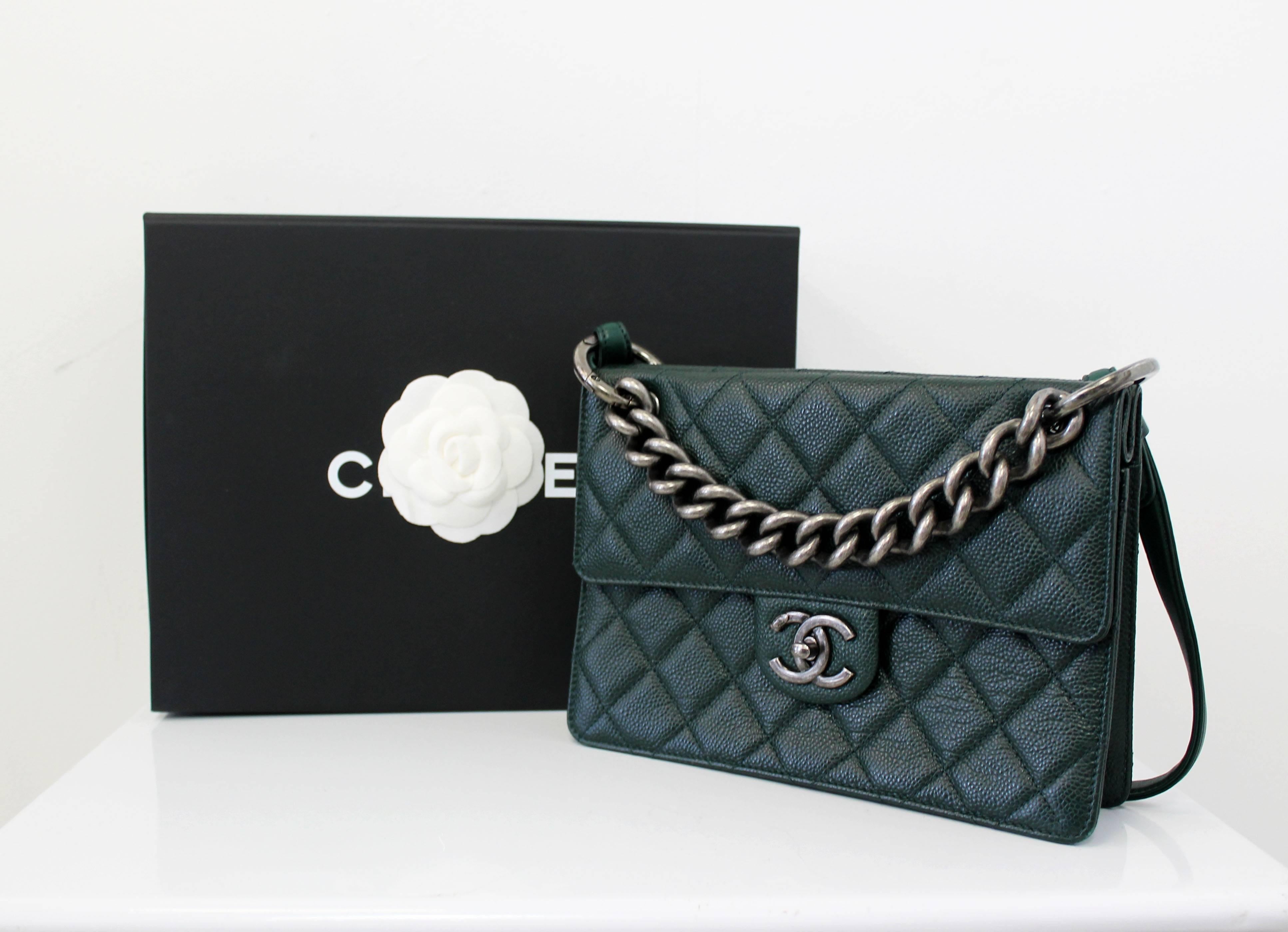 CHANEL 2015 / 2016
Dark Green Quilted Caviar Leather Retro Class Medium Flap Bag 
This stylish and functional Chanel Black Quilted Caviar Leather Retro Class Medium Flap Bag makes a perfect everyday bag. 

It features Green quilted caviar