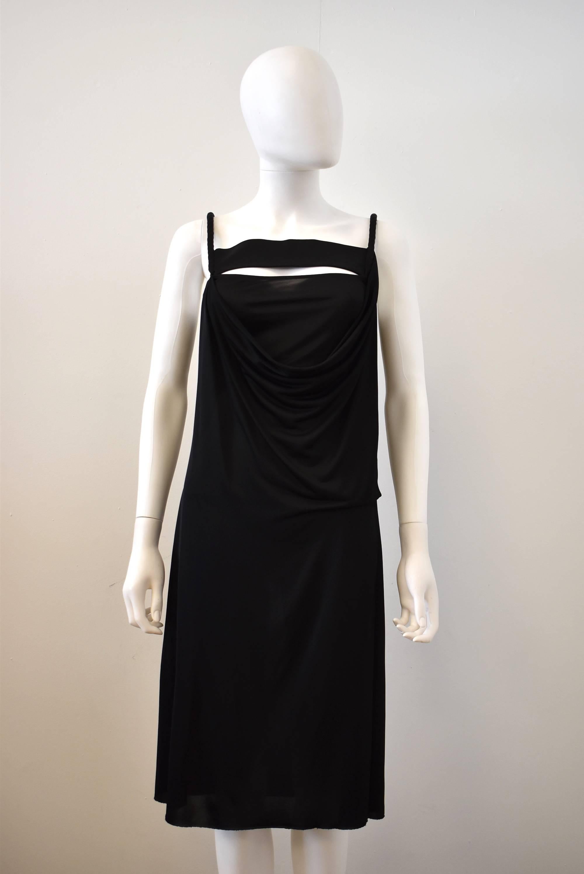 A beautiful Givenchy dress constructed from a bandeau bralet with rope shoulder straps and a draped cowl front and back. The dress subtly clings to the body and drapes to give the dress shape and movement. The dress is a size XS and is made from a