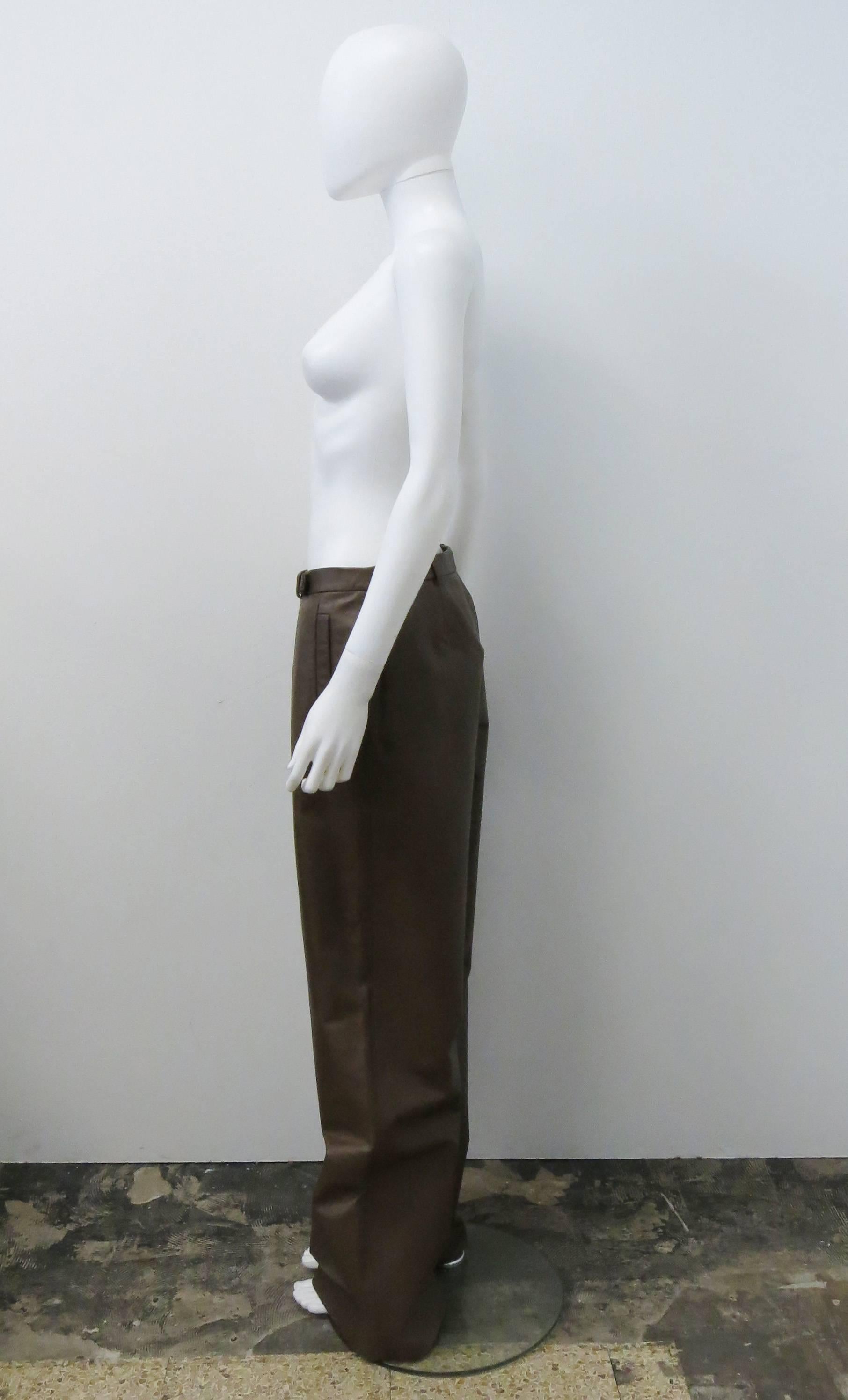 A pair of 1990’s Jil Sander Tan leather trousers. The trousers are made of 100% leather with a luxurious silk lining. They have a wide-leg and low-rise cut and are marked as an Italian size 42 which translates to a UK 10 (please see measurements for