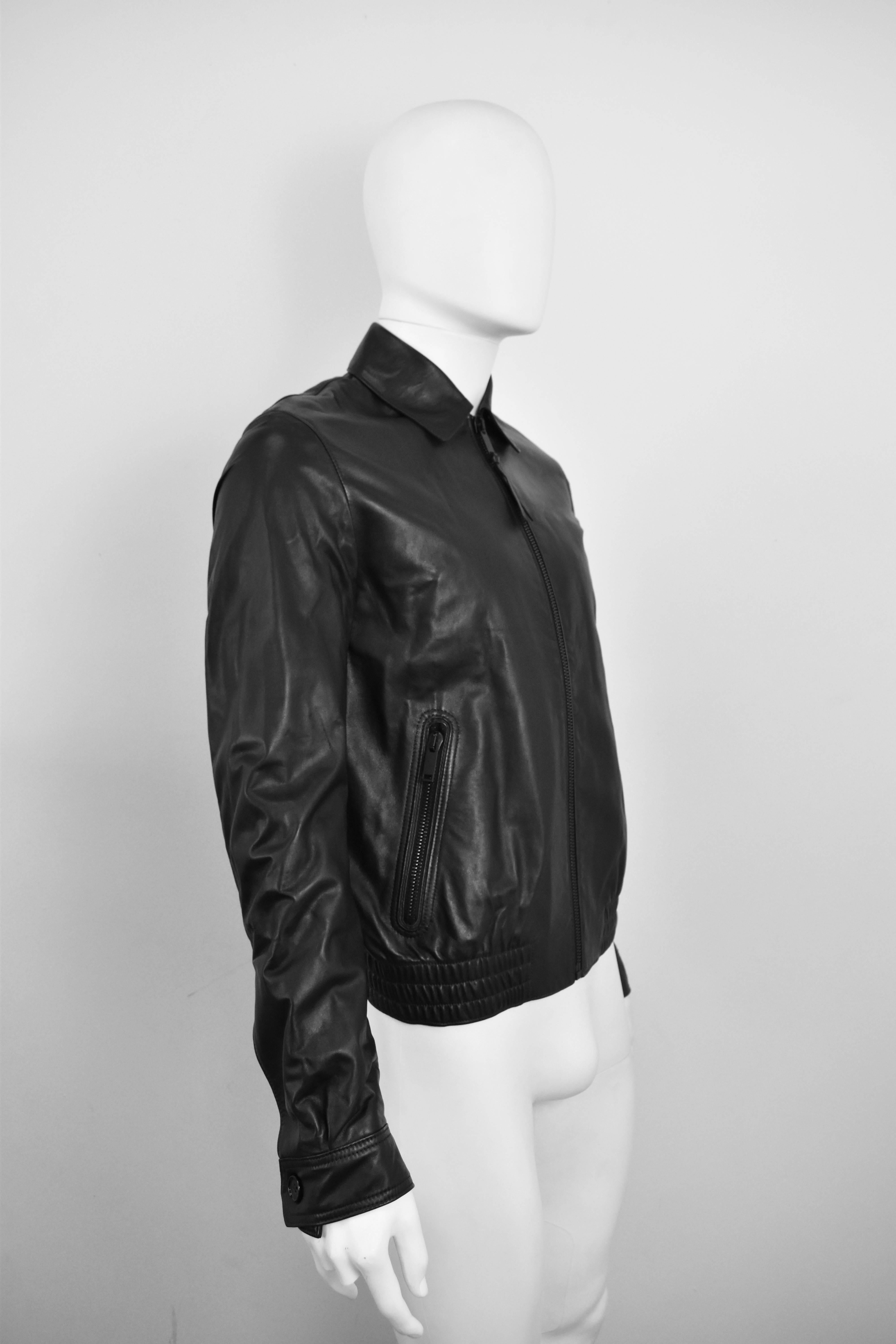 Alexander McQueen Black Leather Jacket. 

McQueen leather jacket with zip front, two side zip pockets, and elasticated trims.The point collar makes for a sharp look.  


Length - 25
Bust - 42
Waist - 41
Hips - 37
Sleeve length - 27.5