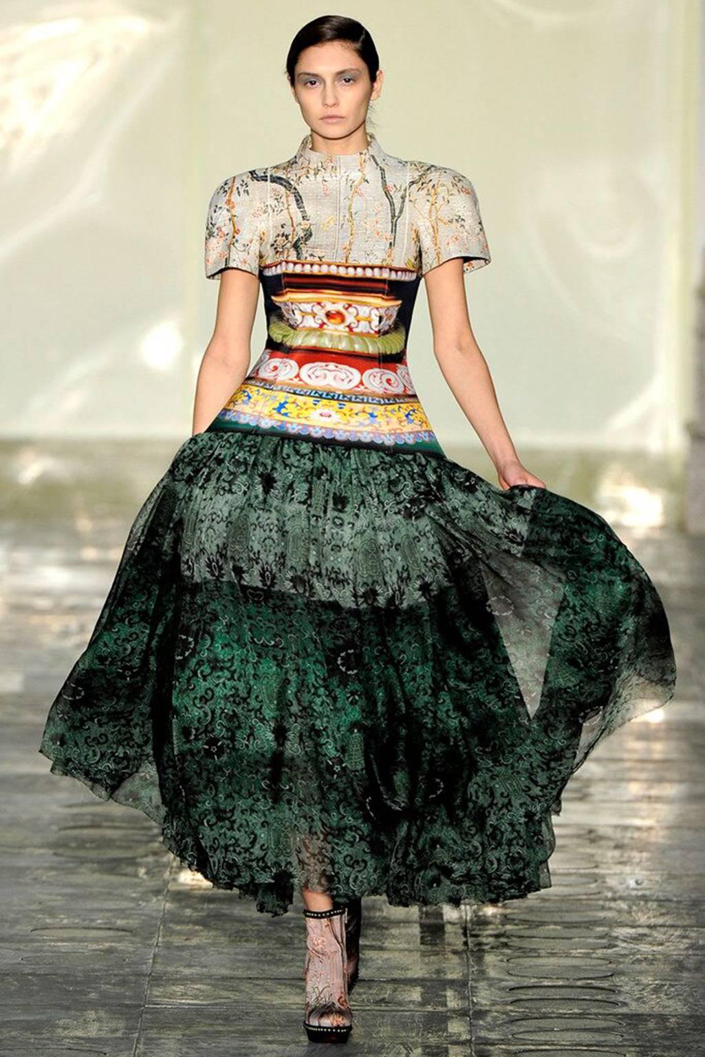 Beautiful Mary Katrantzou runway top from Autumn/Winter 2011 collection. Features floral brocade and hyper vivid print on rigid neoprene-like fabric with a zip closure at the back. Can be pared with our Mary Katrantzou screen printed peplum skirt