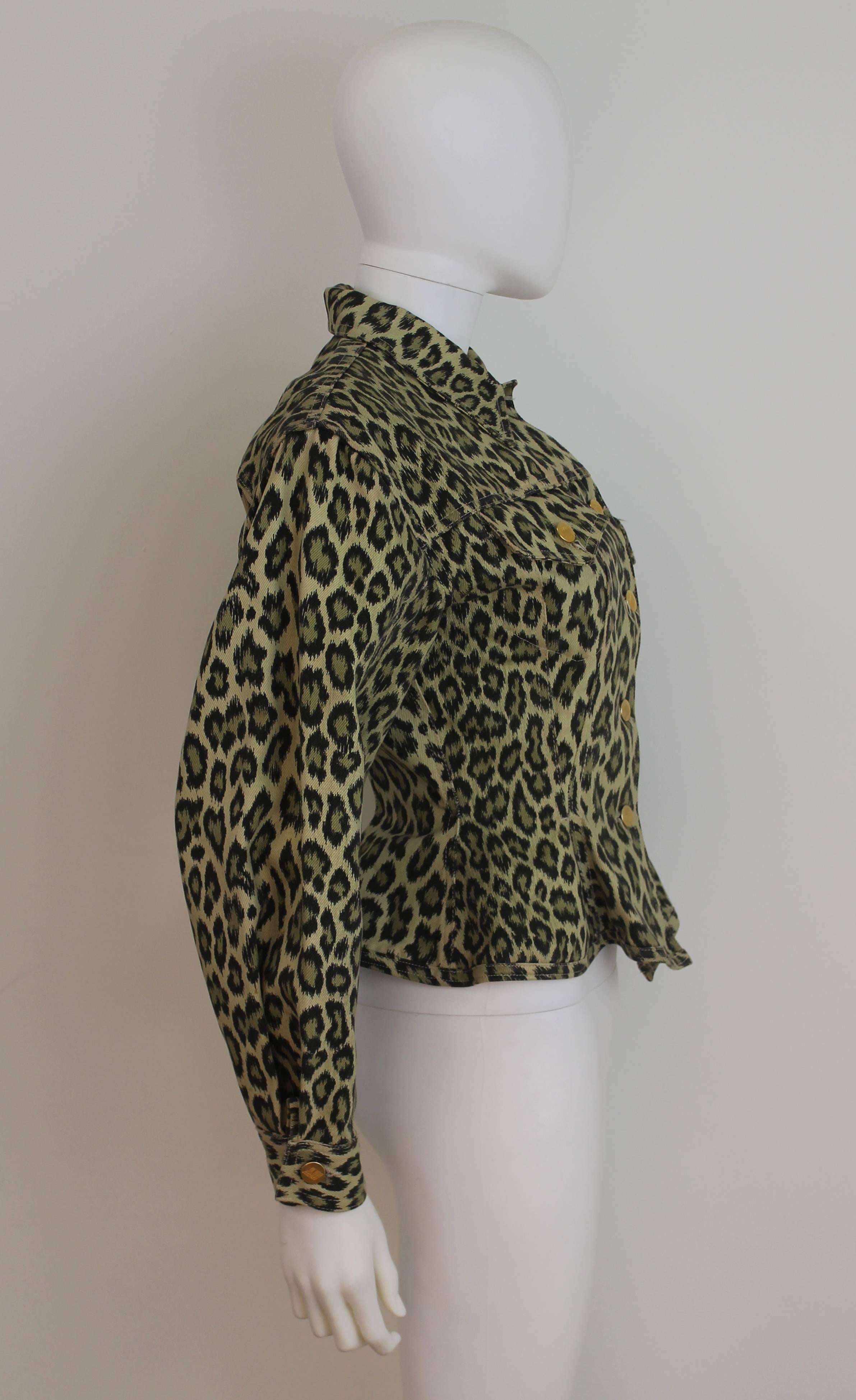 Iconic Junior Gaultier leopard print jacket from 1988 with lightly flared peplum detailing around the hip. Features Junior Gaultier logo buttons and two patch pockets at the bust.