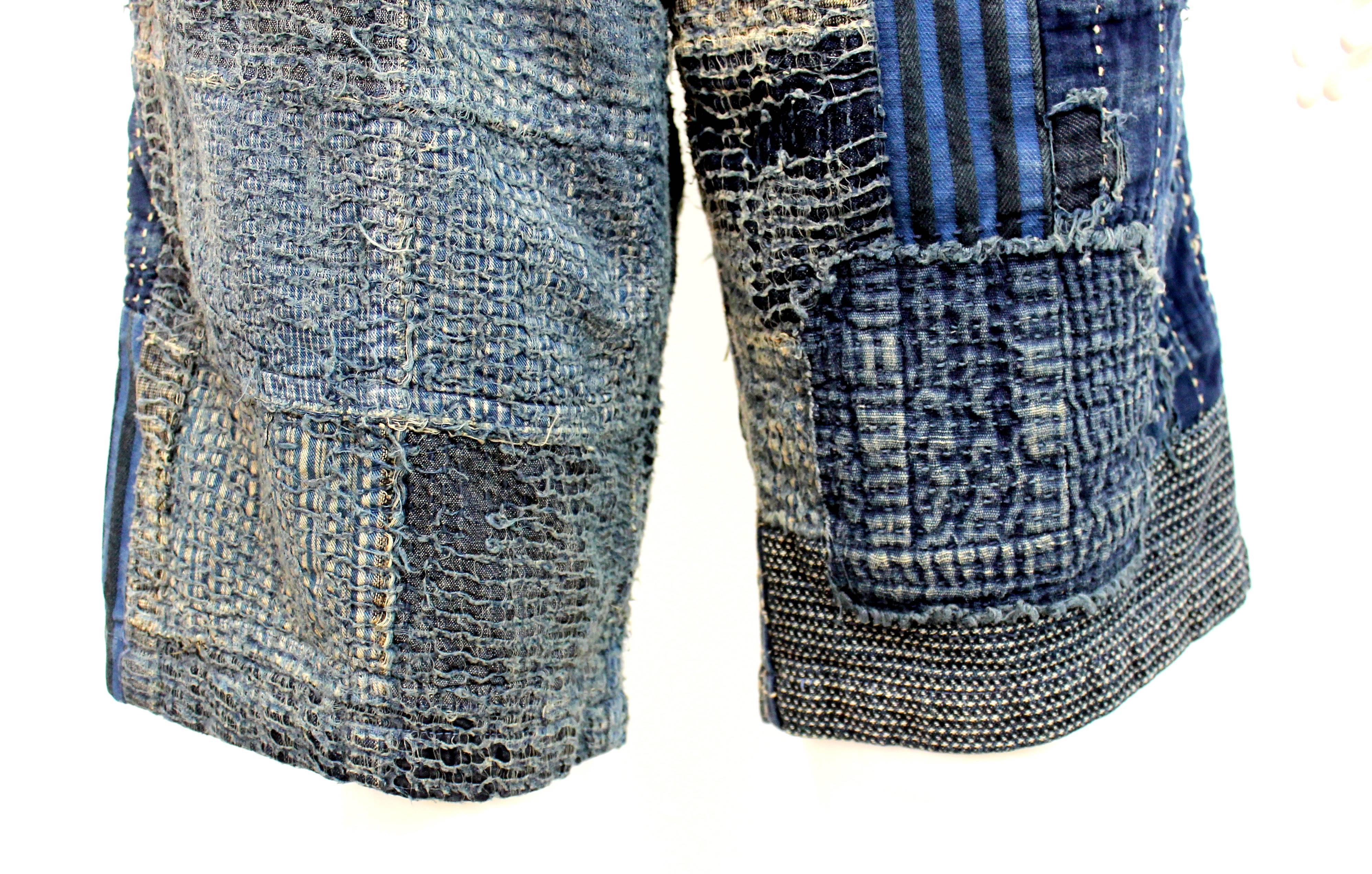 Unique Louis Vuitton denim patchwork shorts from the iconic brand Spring Summer 2013, designed by Kim Jones. Features incredible textured patches in many different shades of denim and cotton. 