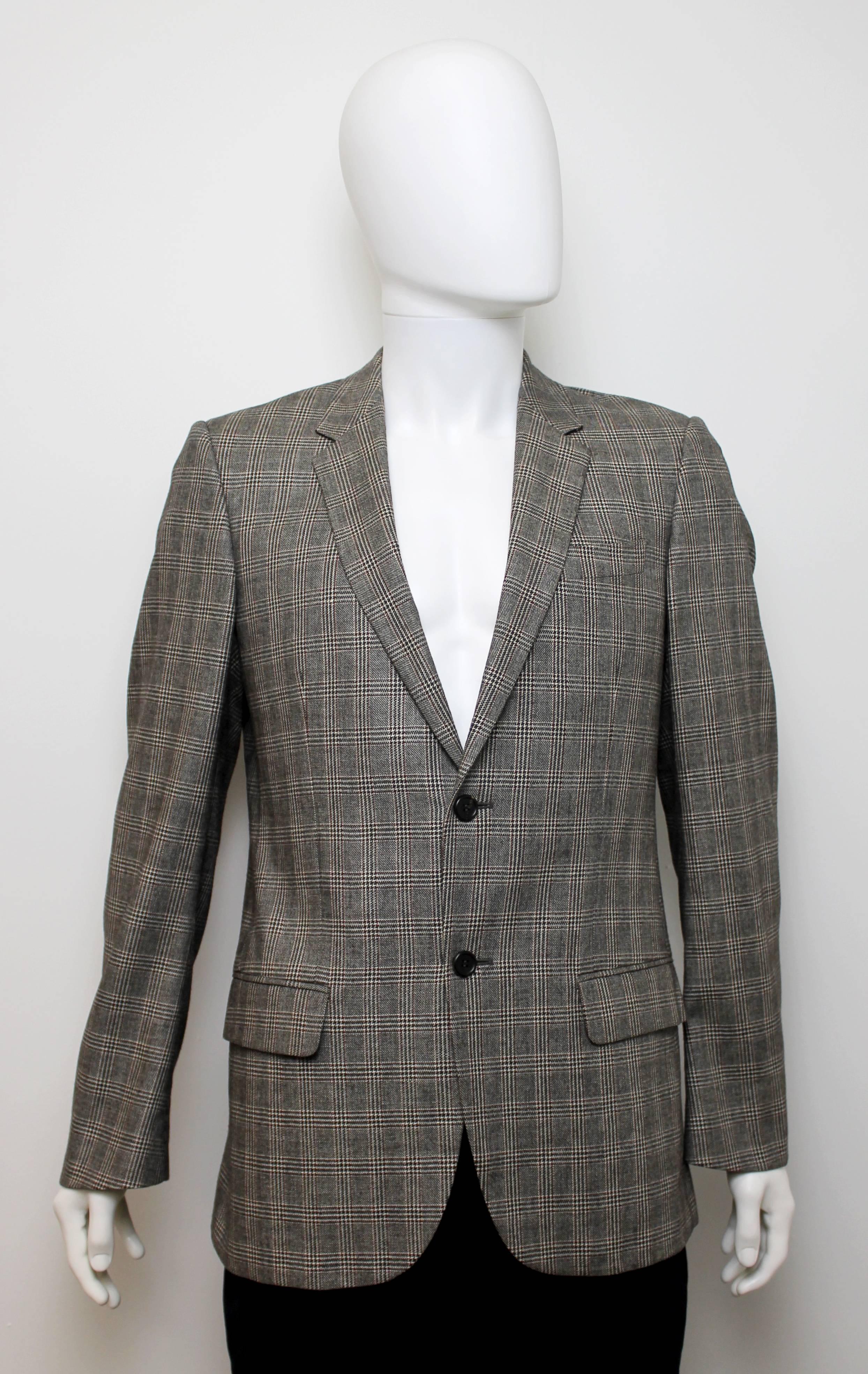 Beautifully tailored jacket and waistcoat ensemble by Alexander McQueen from Autumn-Winter 2006. Features a thin collar and multiple pockets. Can be worn together or separate.