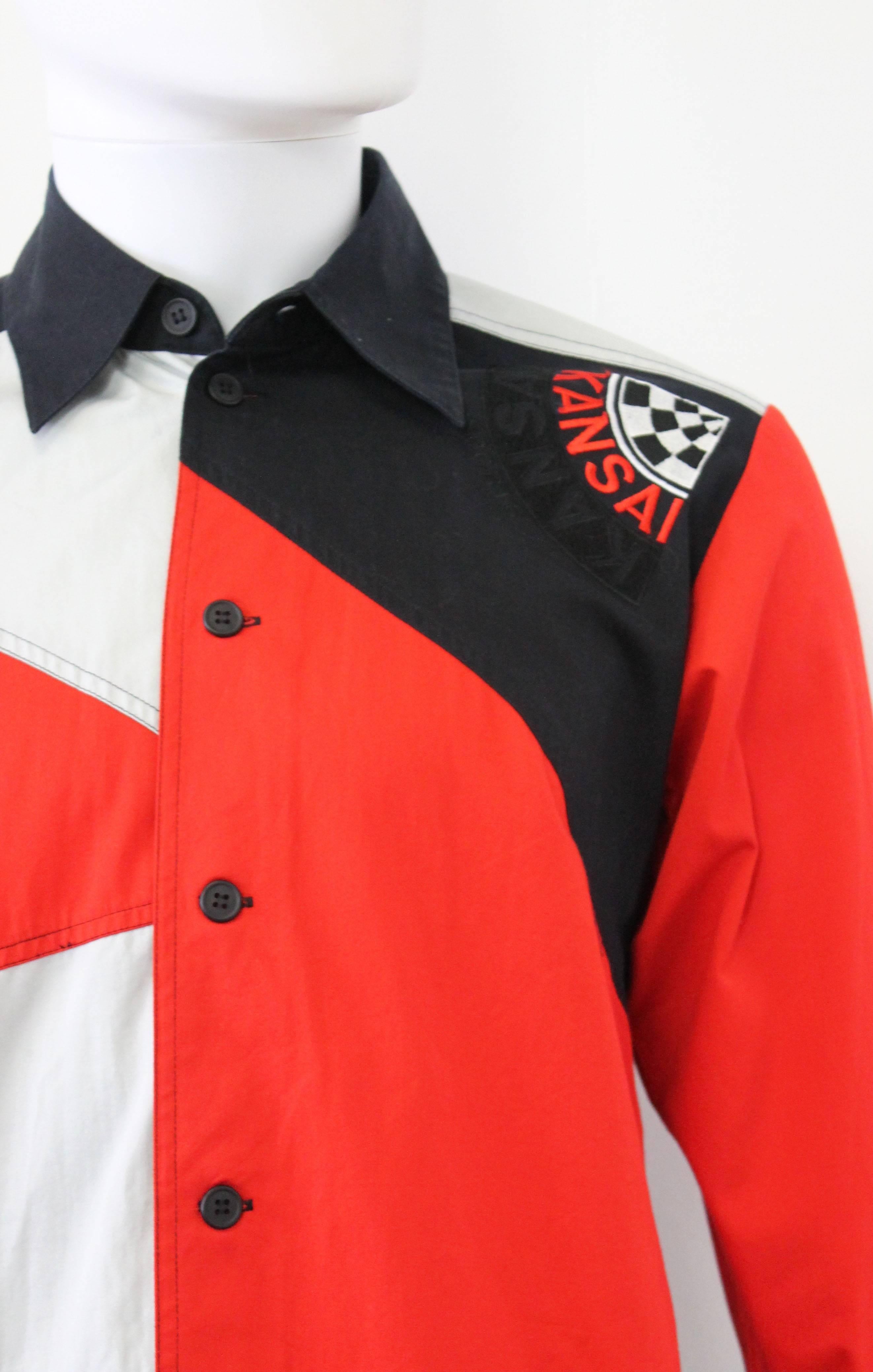 This colour block shirt dates back to the late 80s, early 90s. The shirt is constructed from white, red and navy triangular shapes and embroidered with the ‘Kansai Sports’ logo on the pocket and back. This shirt would look equally as good on a