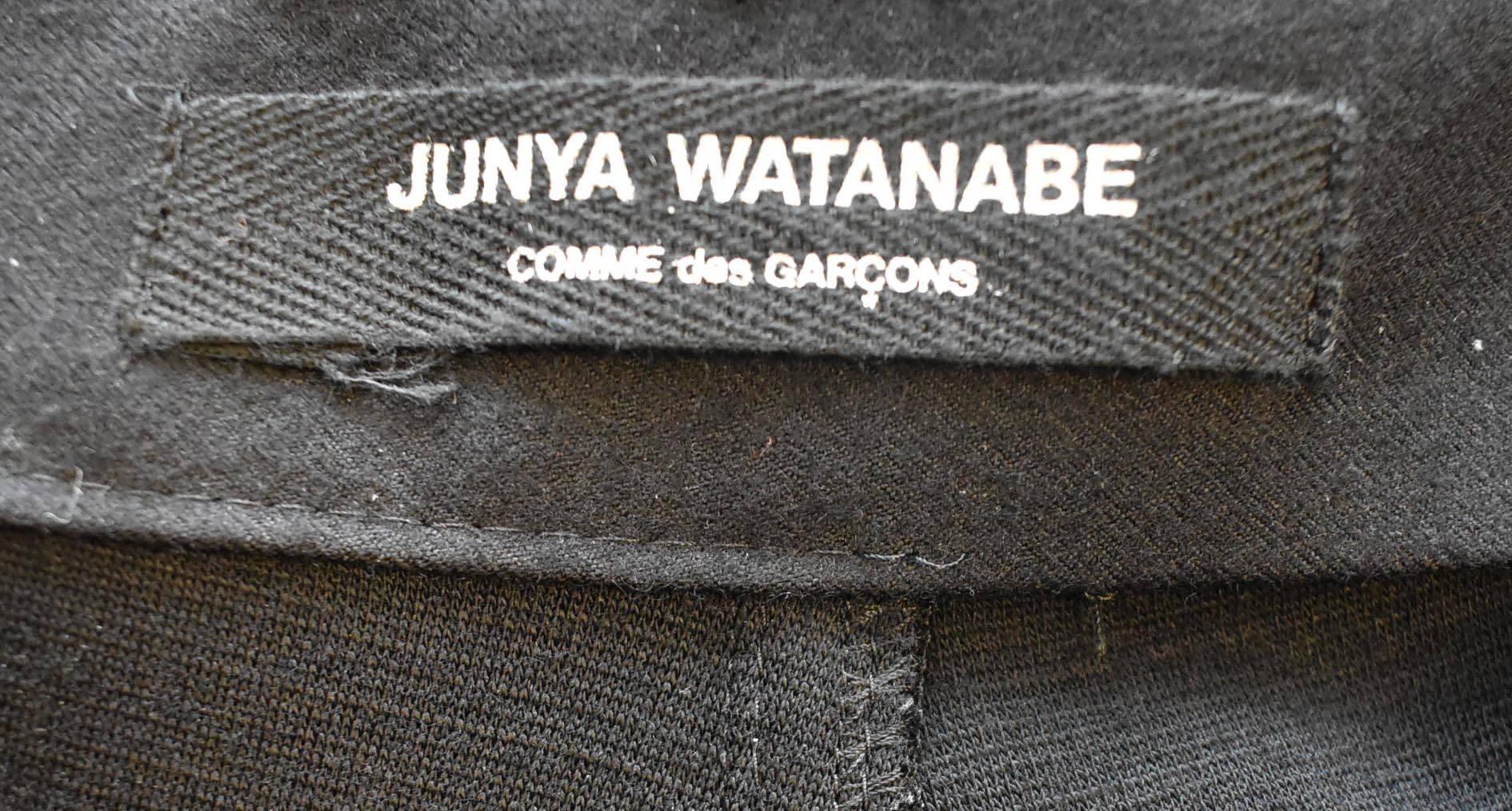 Junya Watanabe CDG AW15 Punk black studded skinny jeans with slashed knee In Excellent Condition In London, GB