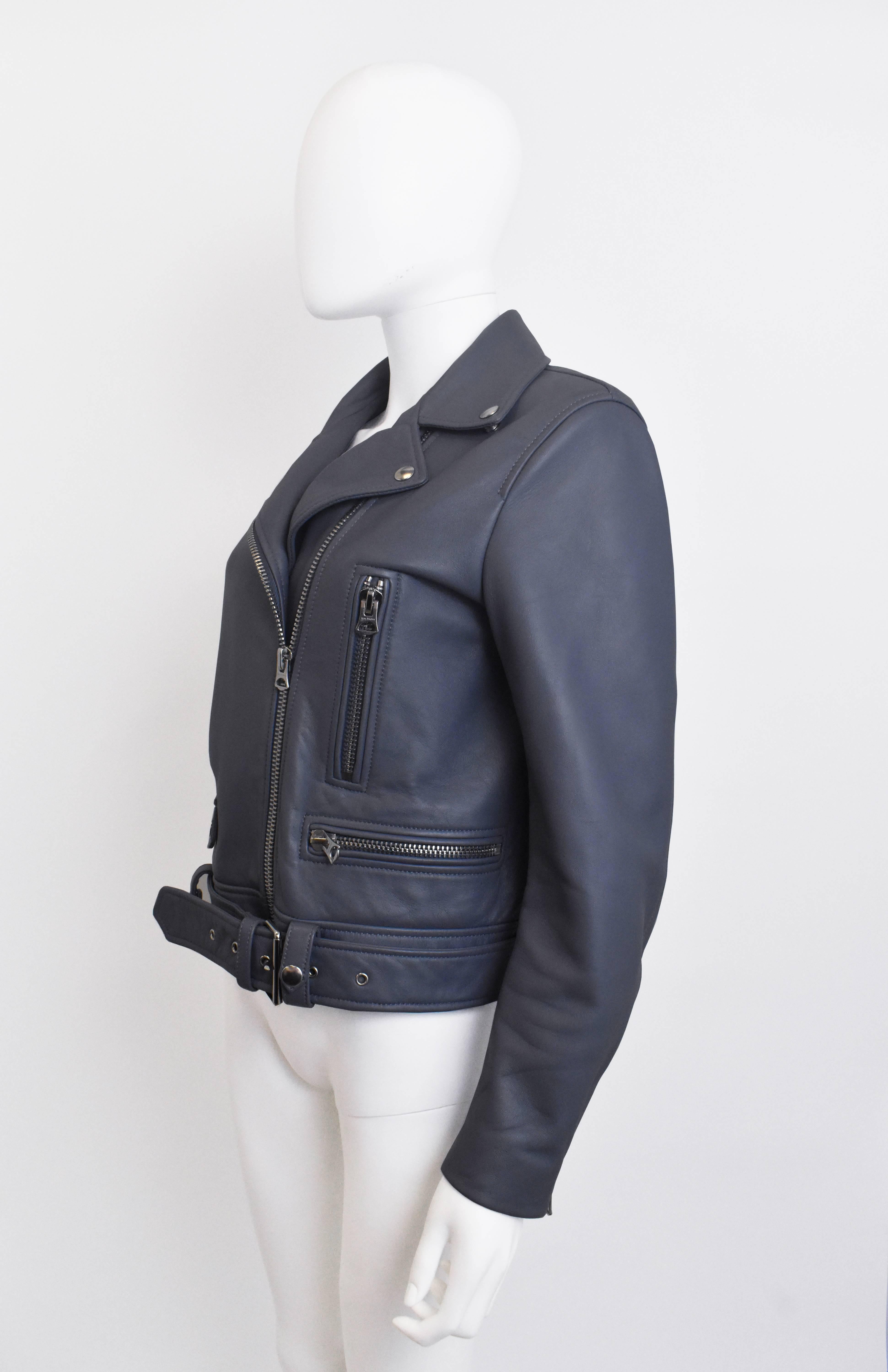 A classic biker jacket with a modern twist, this jacket from Acne Studios is made from a blue/purple dyed leather and cut in the design house's signature style. With its boxy silhouette, asymmetric zip, collar, belt and silver hardware details, the