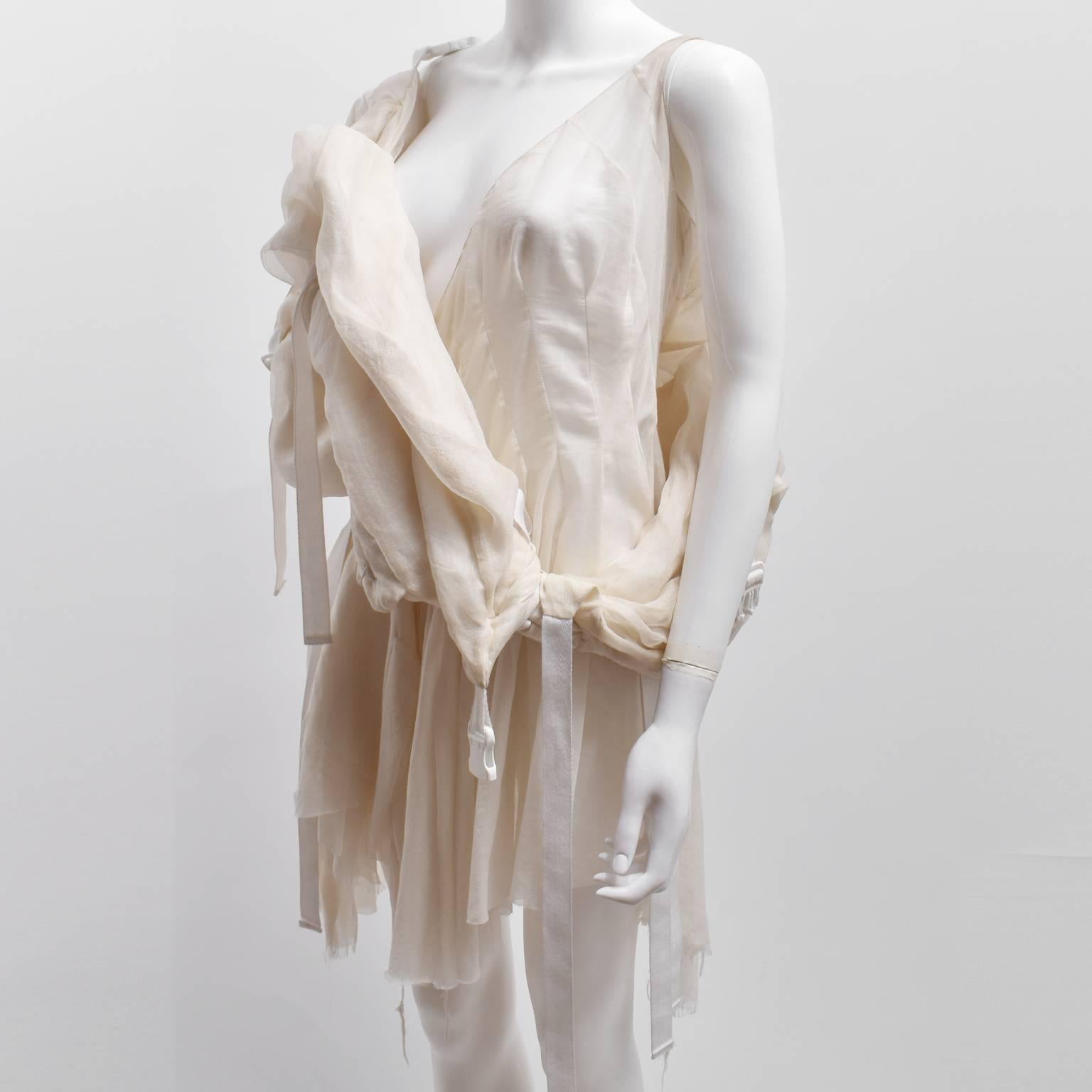 A beautiful and rare dress from Meadham Kirchoff’s Spring Summer 2010 runway collection. This is the dress that was worn on the runway and so features a label from the press agency. The dress is inspired by parachutes with padded, three dimensional