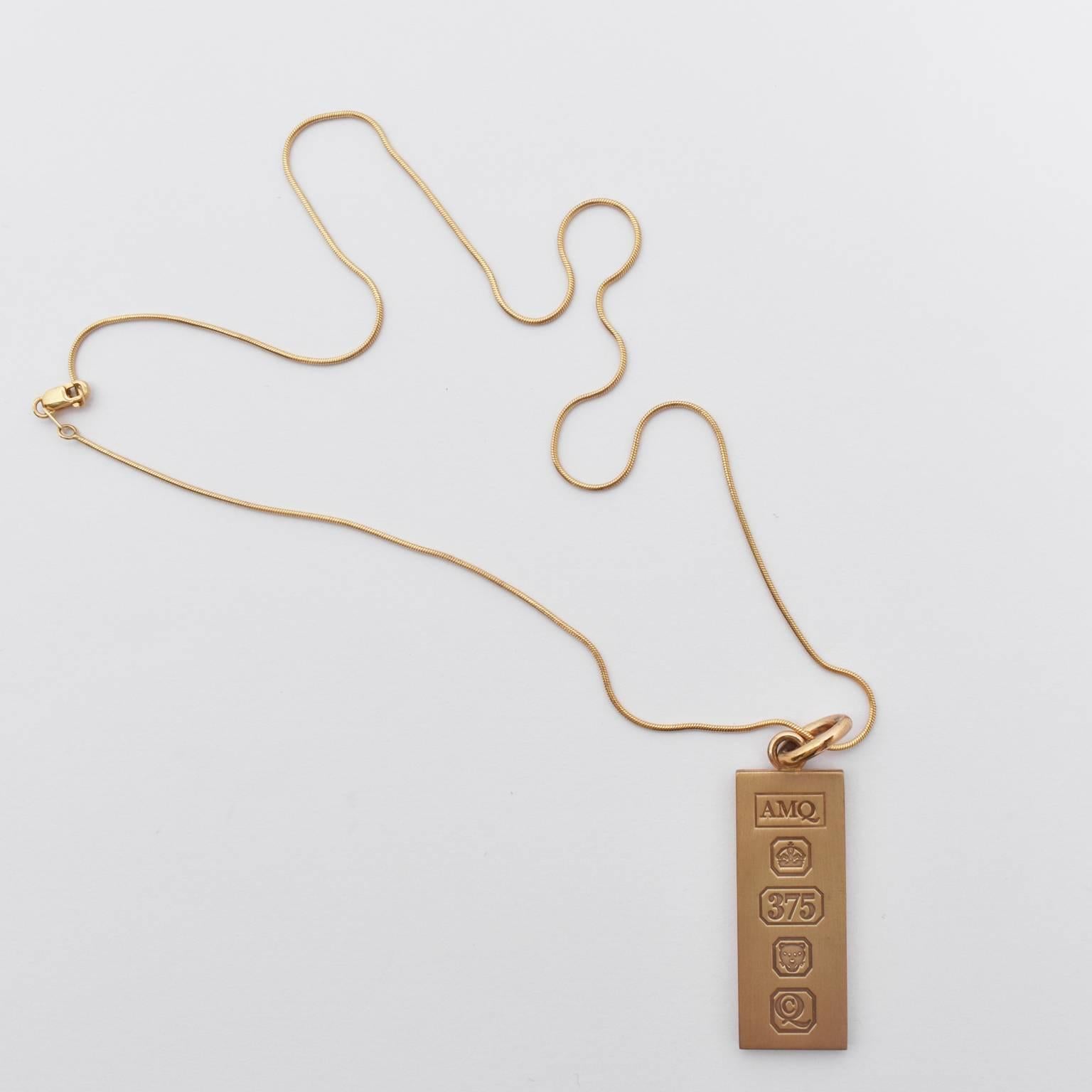 A gold tag pendant necklace by celebrated jewellery designer Shaun Leane for Alexander McQueen. The pair had a strong working relationship with Leane creating some of the most extravagant and sculptural pieces for McQueen’s theatrical runway shows.