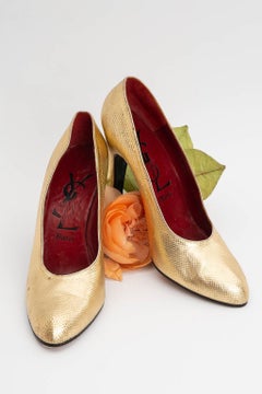 Yves Saint Laurent golden leather pumps