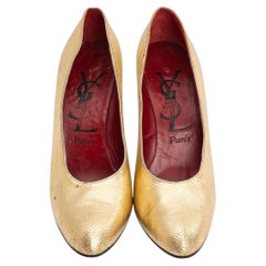 Yves Saint Laurent golden leather pumps