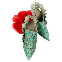 Paule Ka snake pumps