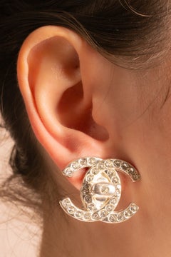 Chanel turnlock earrings by Karl Lagerfeld Fall 1996