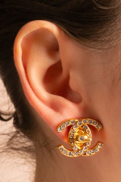 Chanel turnlock earrings by Karl Lagerfeld Fall 1996