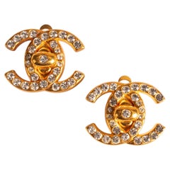 Chanel turnlock earrings by Karl Lagerfeld Fall 1996