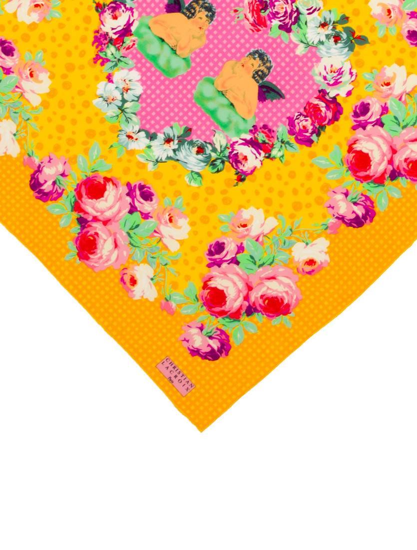 Christian Lacroix 1990s marigold yellow scarf with pink rose print border and two cherubs resting in the center of a heart- perfect for Valentine's, or any other day!

34.5