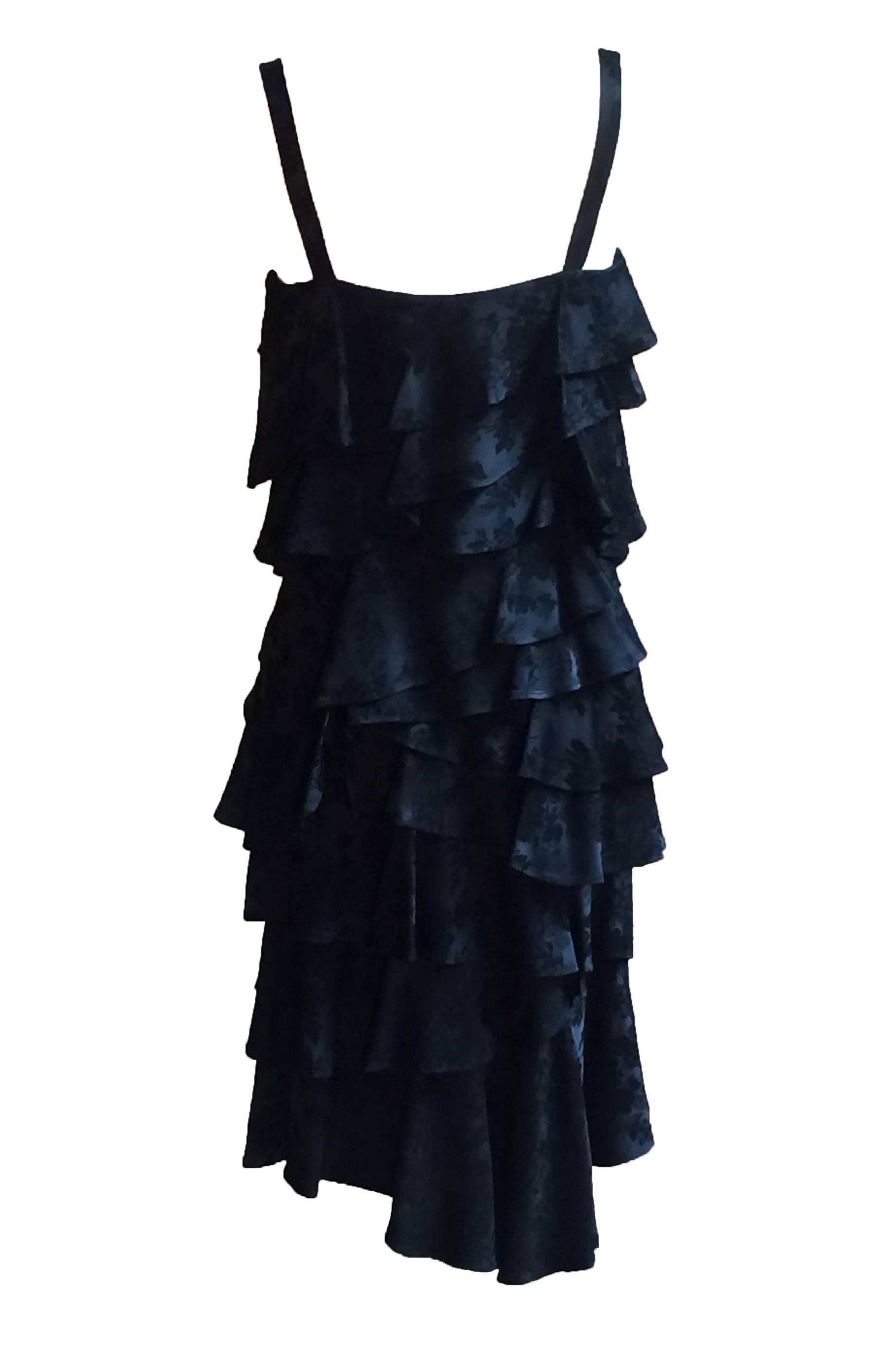 Moschino Couture vintage 1990s black tiered ruffle dress in black floral print. Side zip and hook and eye.

70% acetate, 30% rayon. 

Made in Italy.

Size IT 42, US 8. Fits like modern 2/4. See measurements.
Bust 31