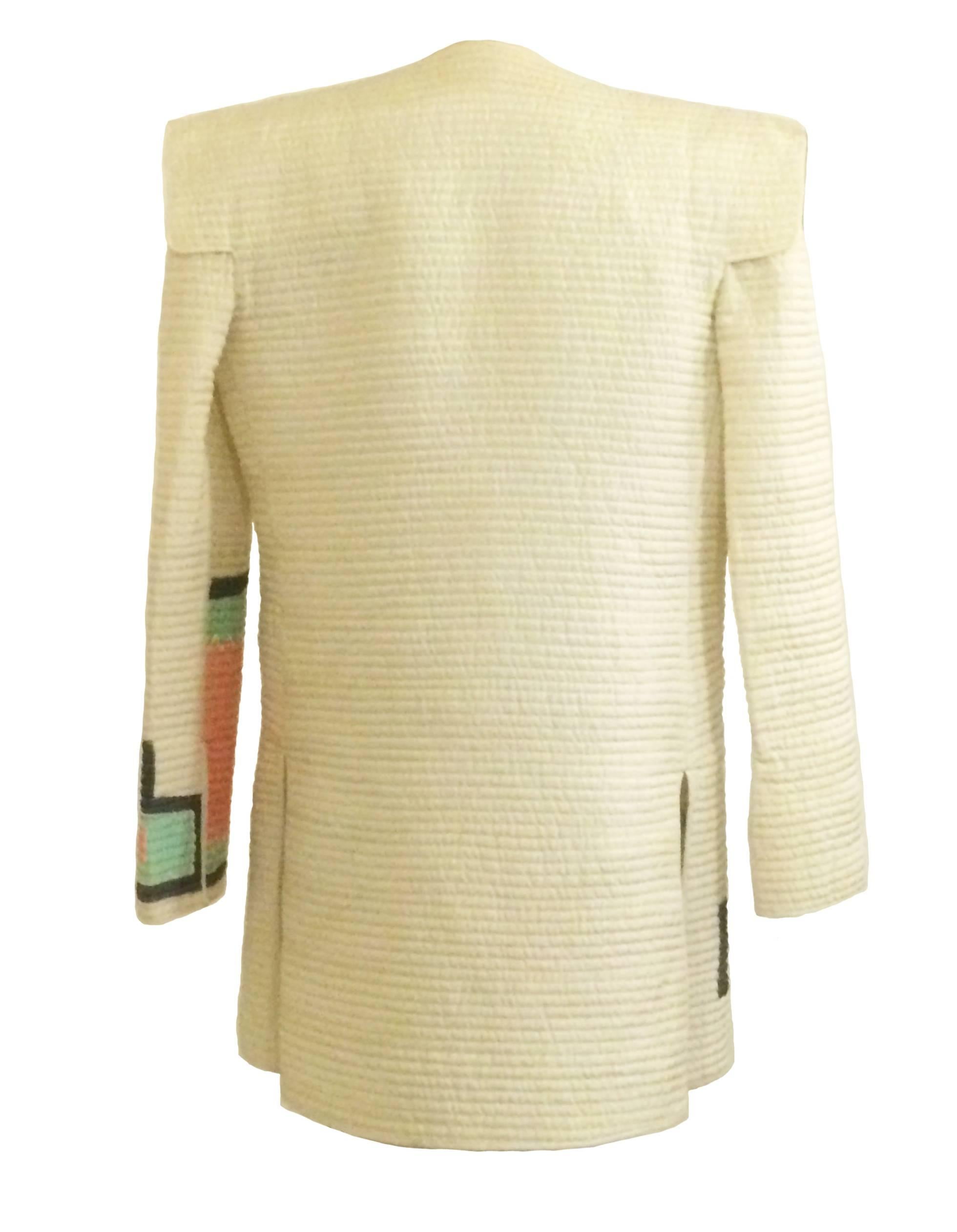 Mary McFadden vintage 1980's cream quilted jacket with pastel print and extended shoulder detail. Open front, light padding at shoulders.

Fabric unknown, feels like silk but could be synthetic.

No size label, best fits S/M, see